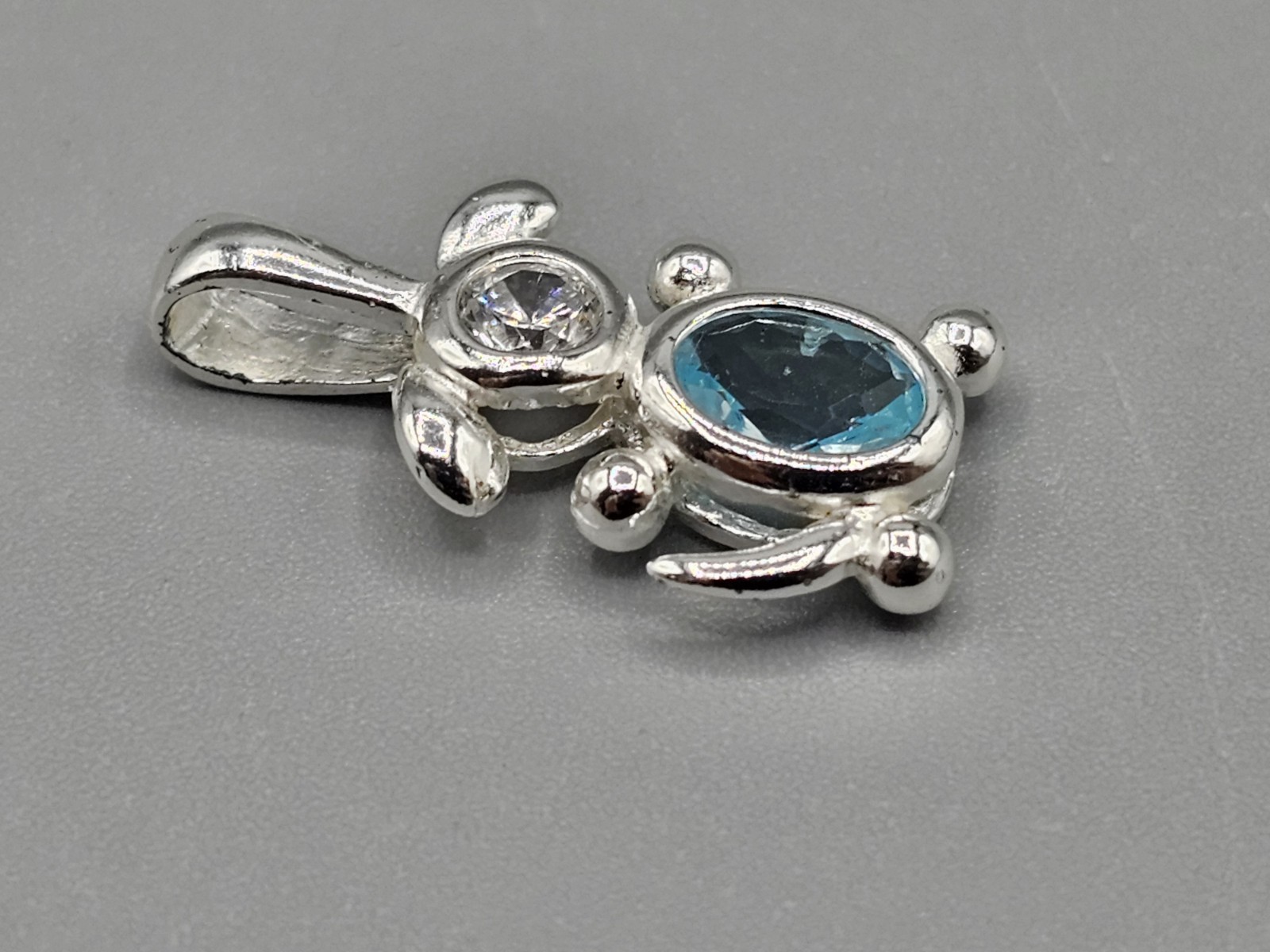 Sterling Silver Dog Bezel/Prong Set Cubic Zirconia Blue Simulated Stone Pendant