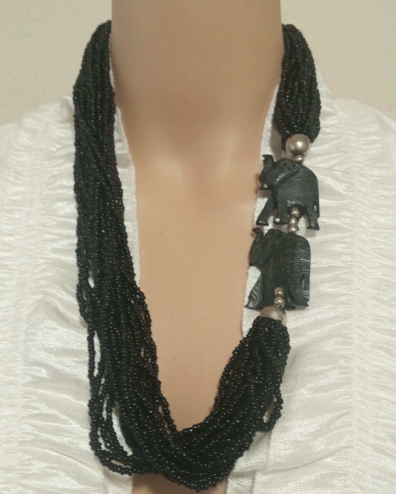 Layered Seed Bead Tribal Necklace with Carved Wooden Elephants Upturned Trunk