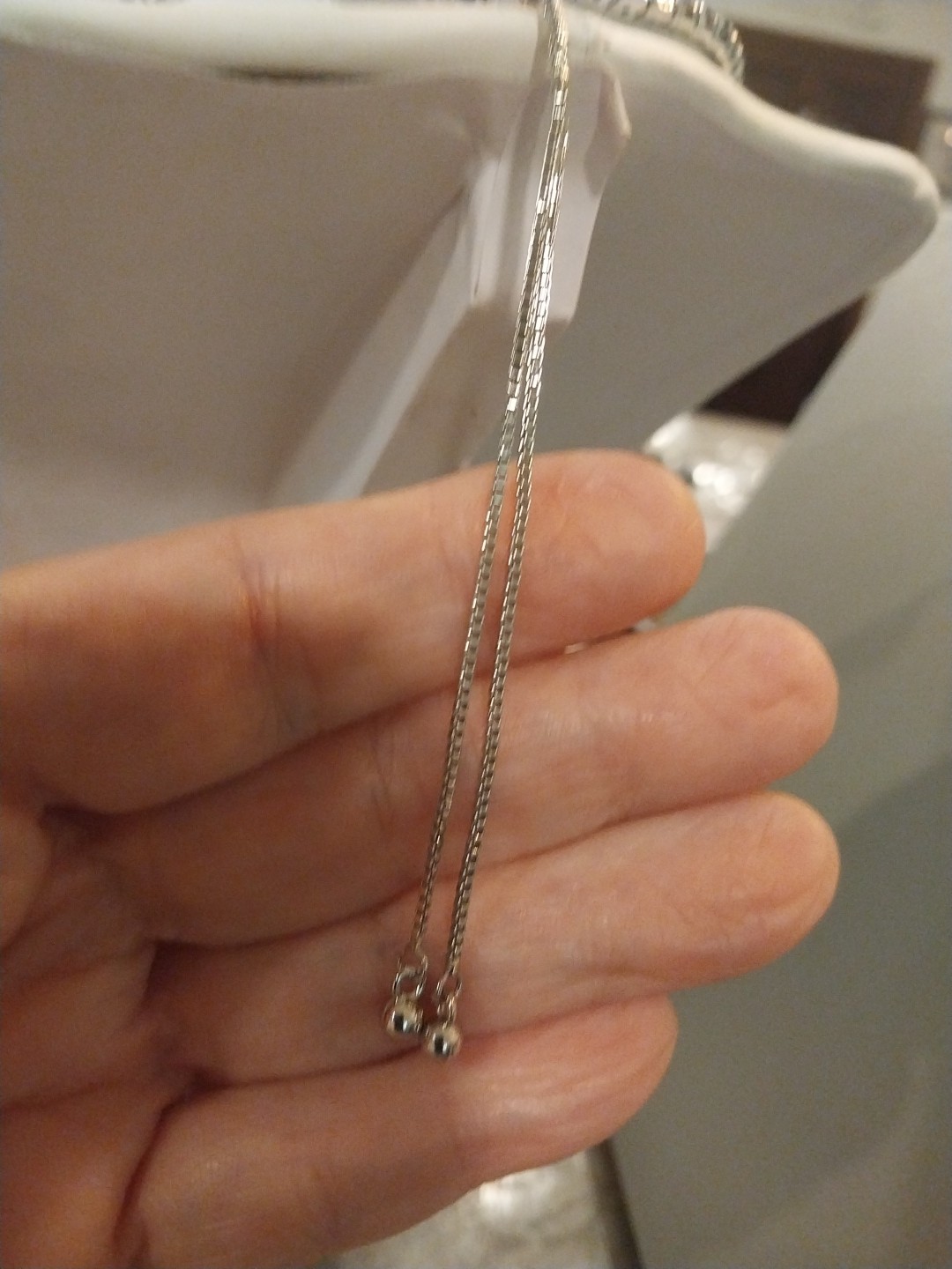Simulated Sapphire Tennis Necklace (18-26 Inches) with Bolo Slider in Silvertone