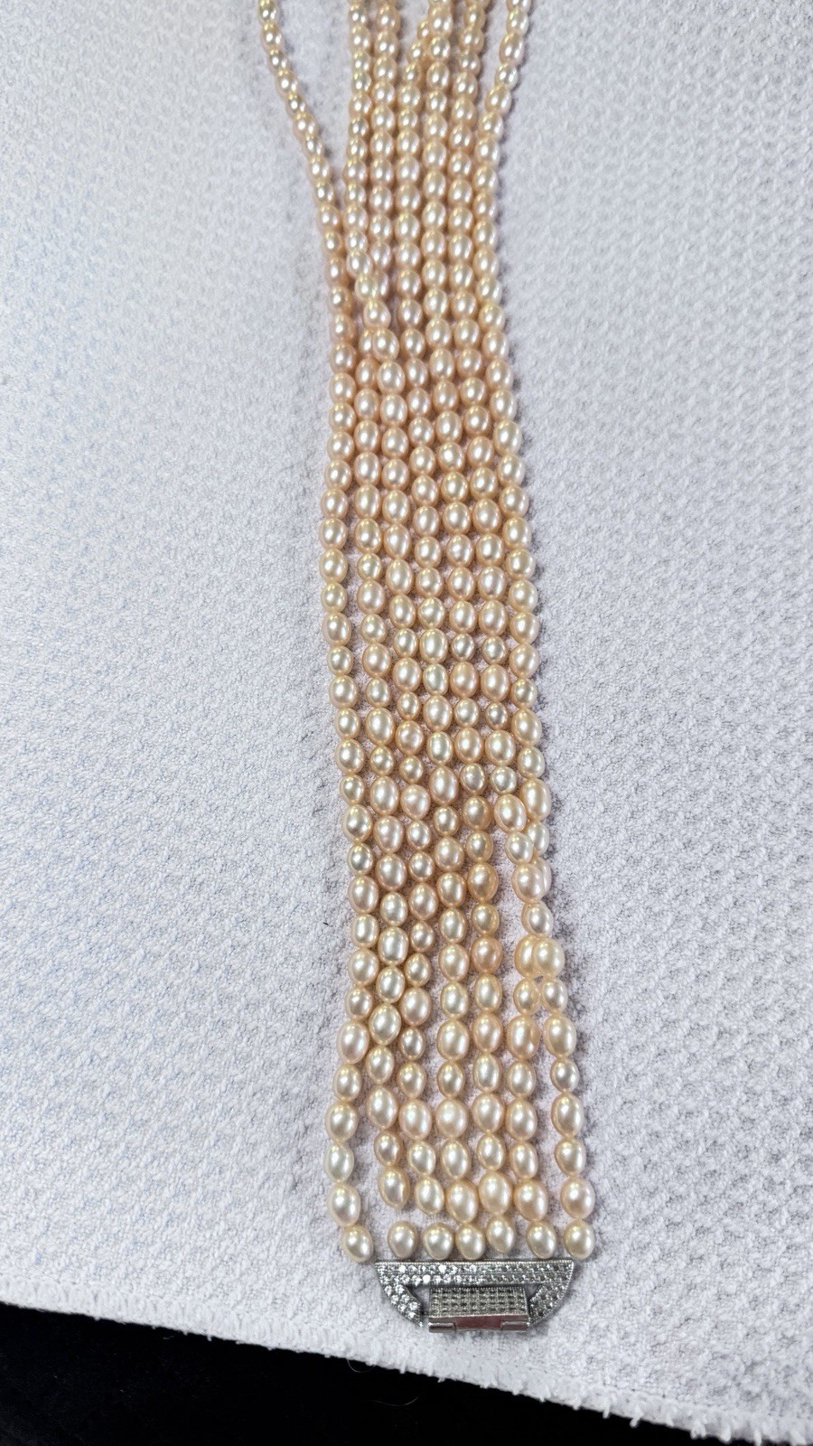 High-quality multi-strand freshwater pearls (6–7mm) with natural iridescent lust