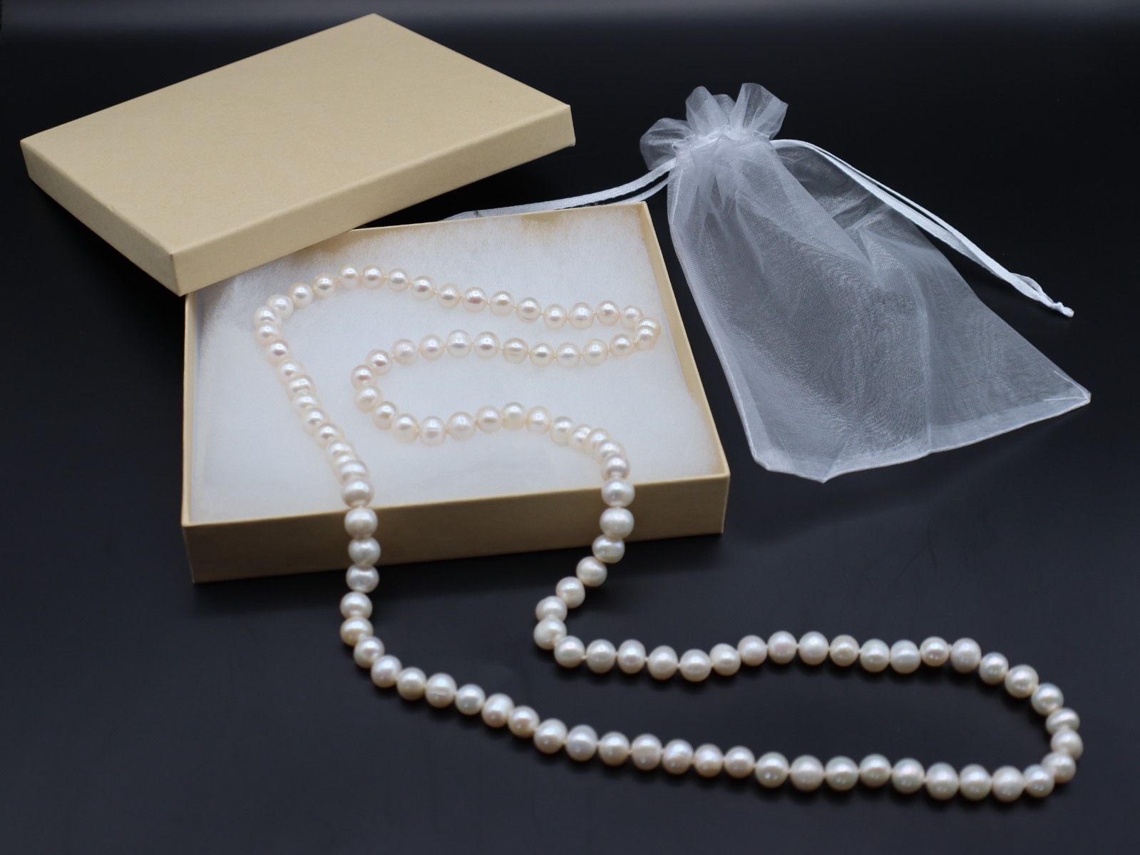 Beautiful Knotted 7-8mm Oval White Cultured Freshwater Pearl Necklace – App 35″