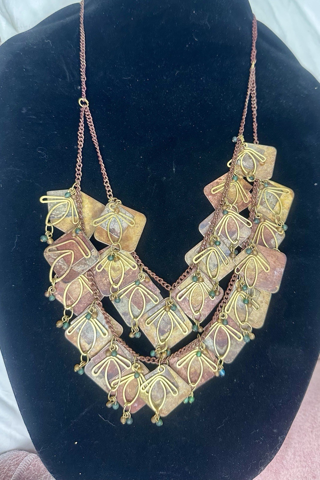 Vintage Metal Artisan Chain with Multi tiered Metal Patina Panels And Charms