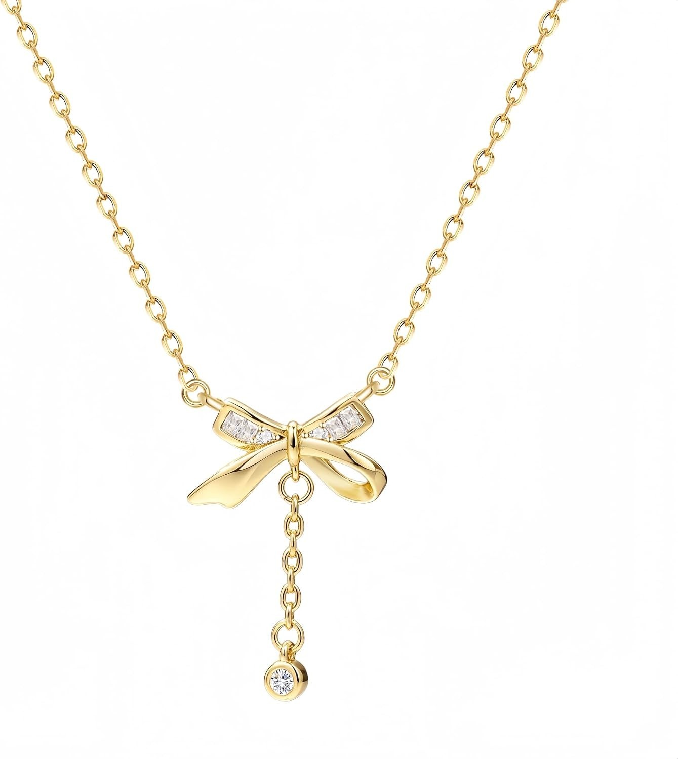 Charming Gold Necklace Set: Heart & Bow Designs with Sparkling Cubic Zirconia