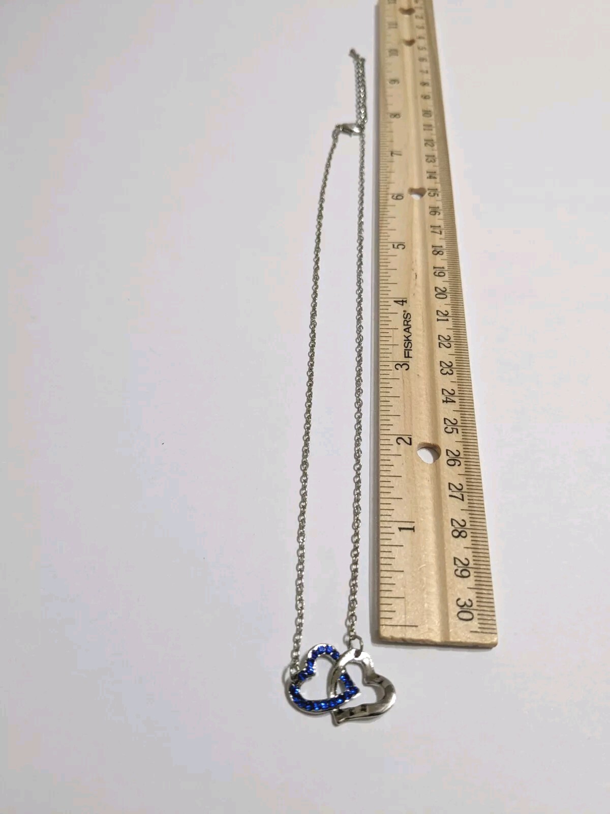 Interlinked Hearts Blue Rhinestones & Silver Tone Pendant Necklace. 16″. 2″ Ext.
