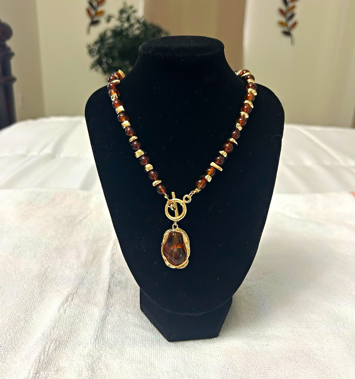 Brown Beaded Necklace Gold Tone Metal Oval Charm Pendant Toggle Bohemian