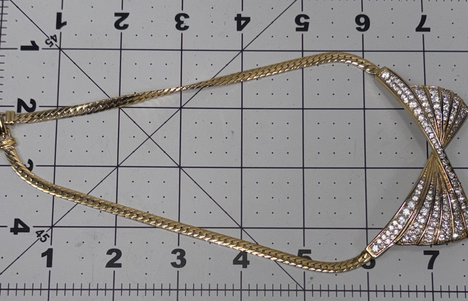 Beautiful Nina Ricci Pave Set Rhinestone Bow Tie Necklace in Goldtone