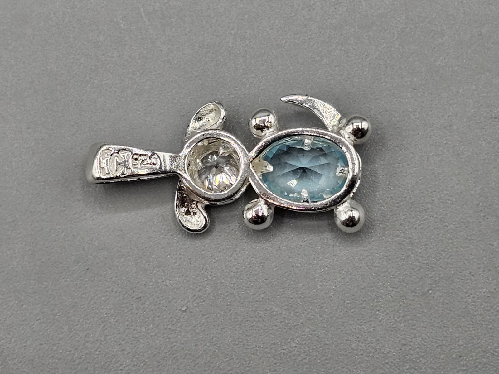 Sterling Silver Dog Bezel/Prong Set Cubic Zirconia Blue Simulated Stone Pendant