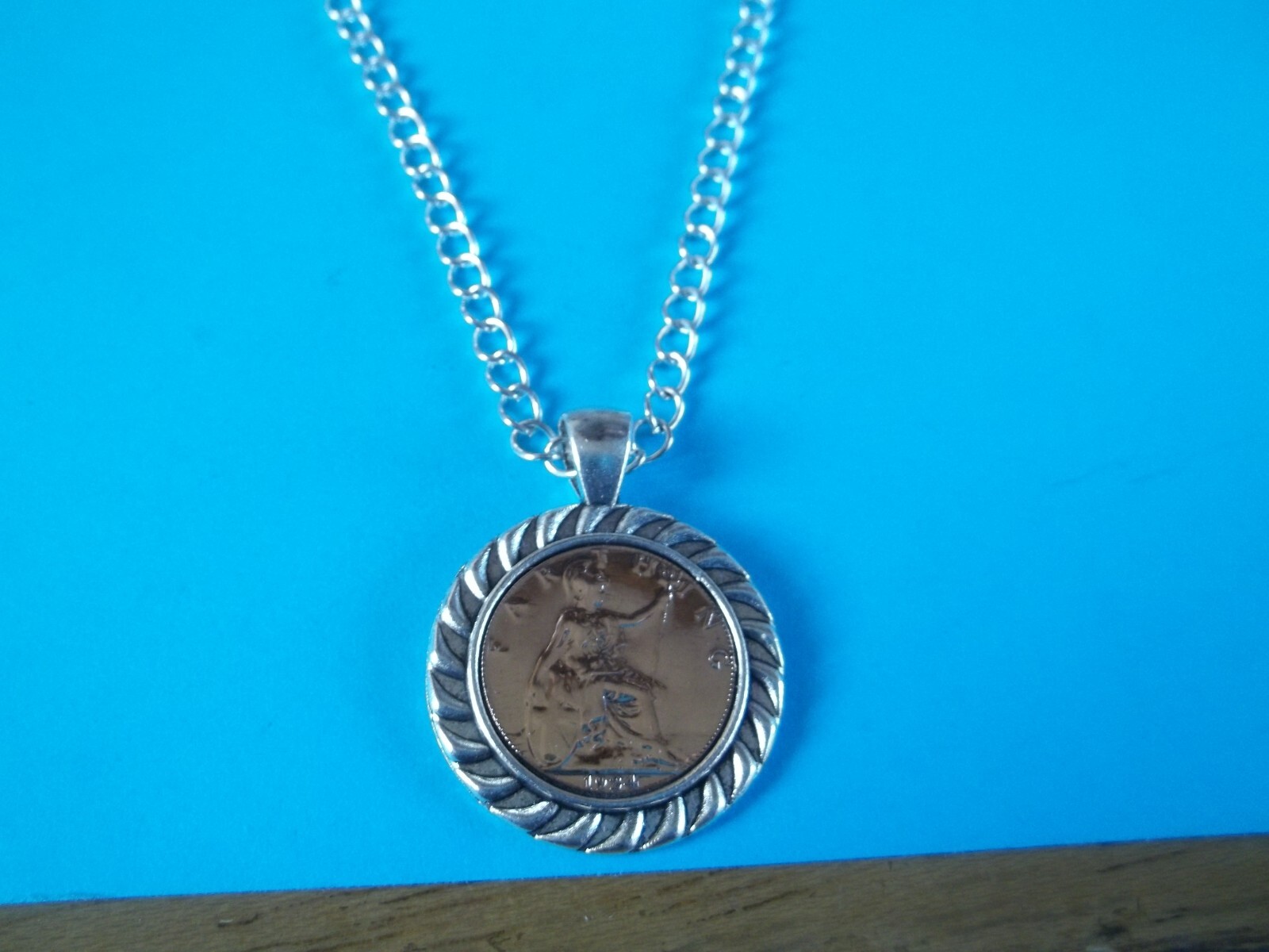 BRITANNIA FARTHING – LIMITED EDITION – SILVER CASED CURB NECKLACE – 1911 to 1936