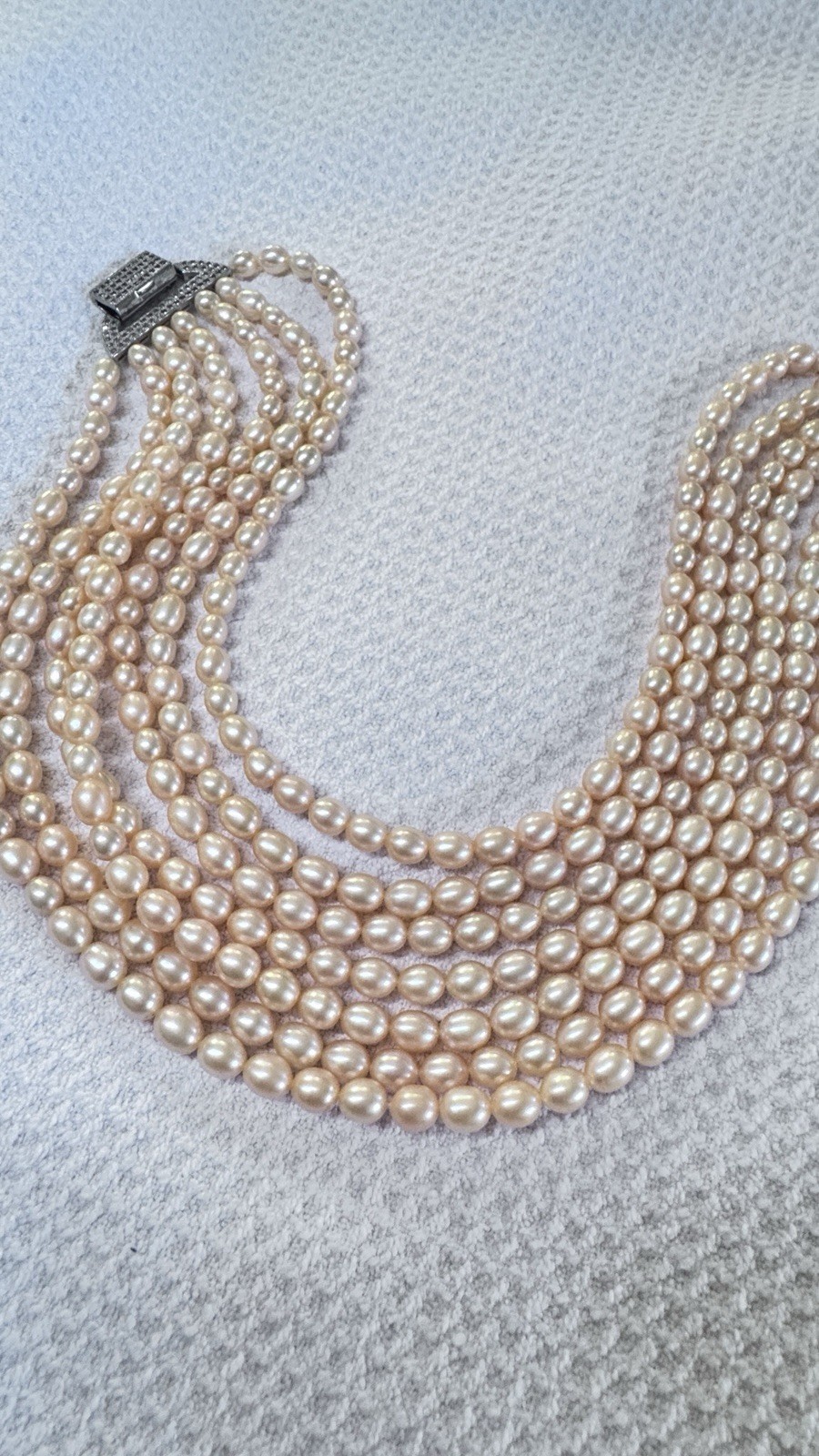 High-quality multi-strand freshwater pearls (6–7mm) with natural iridescent lust