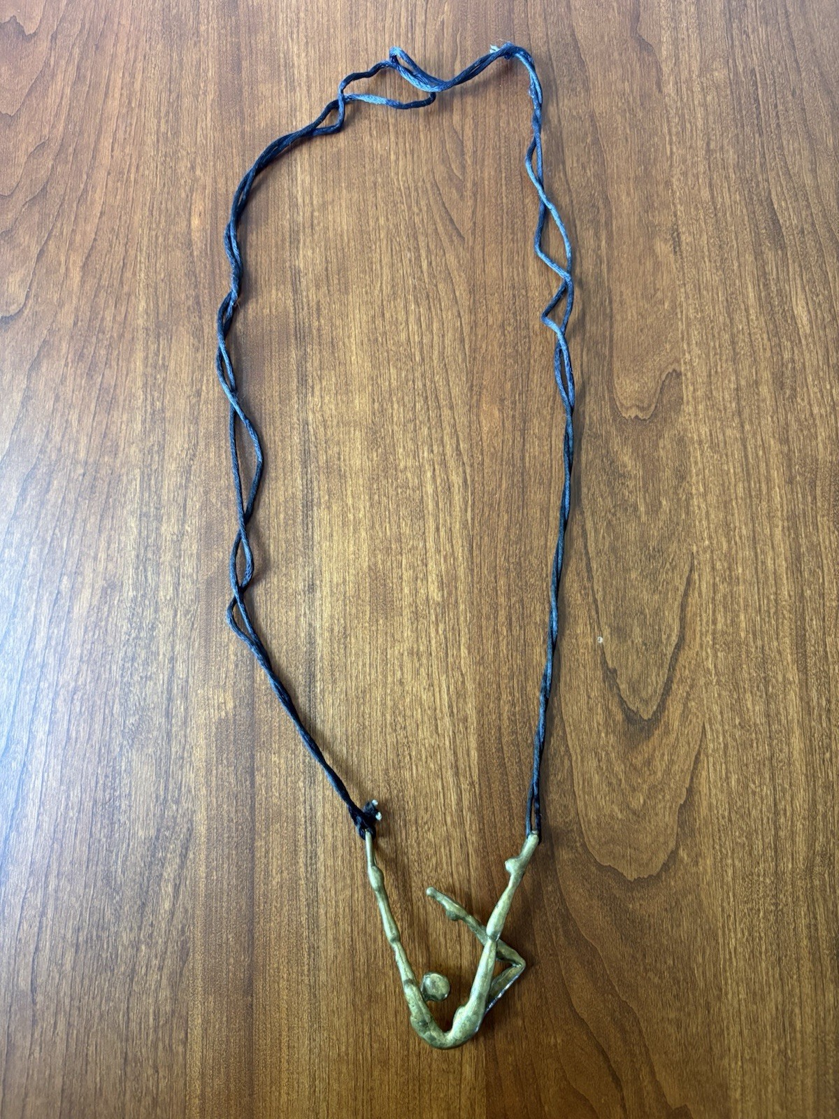 VINTAGE BRASS NUDE DANCER ACROBAT PENDANT ARTISAN BRUTALIST ROPE NECKLACE