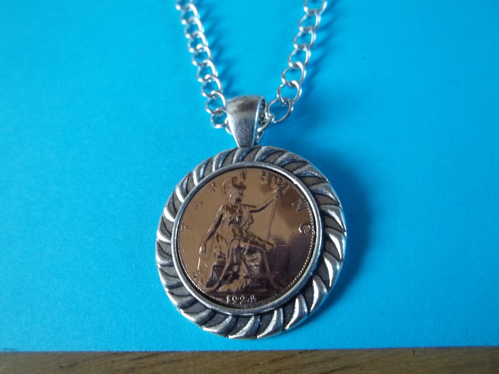 BRITANNIA FARTHING – LIMITED EDITION – SILVER CASED CURB NECKLACE – 1911 to 1936