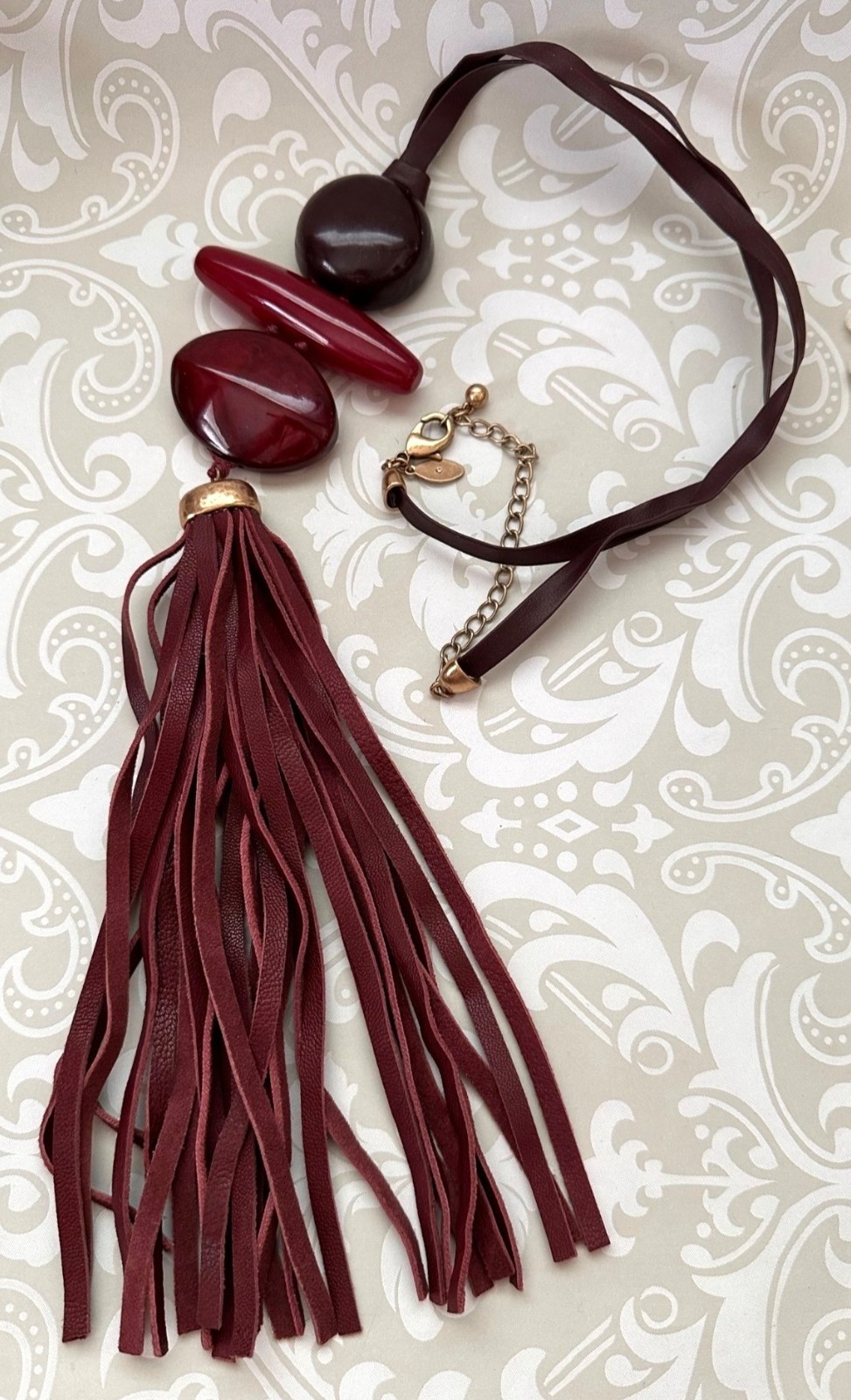 Chicos Pendant Necklace With Burgundy Beads & Faux Leather Tassel
