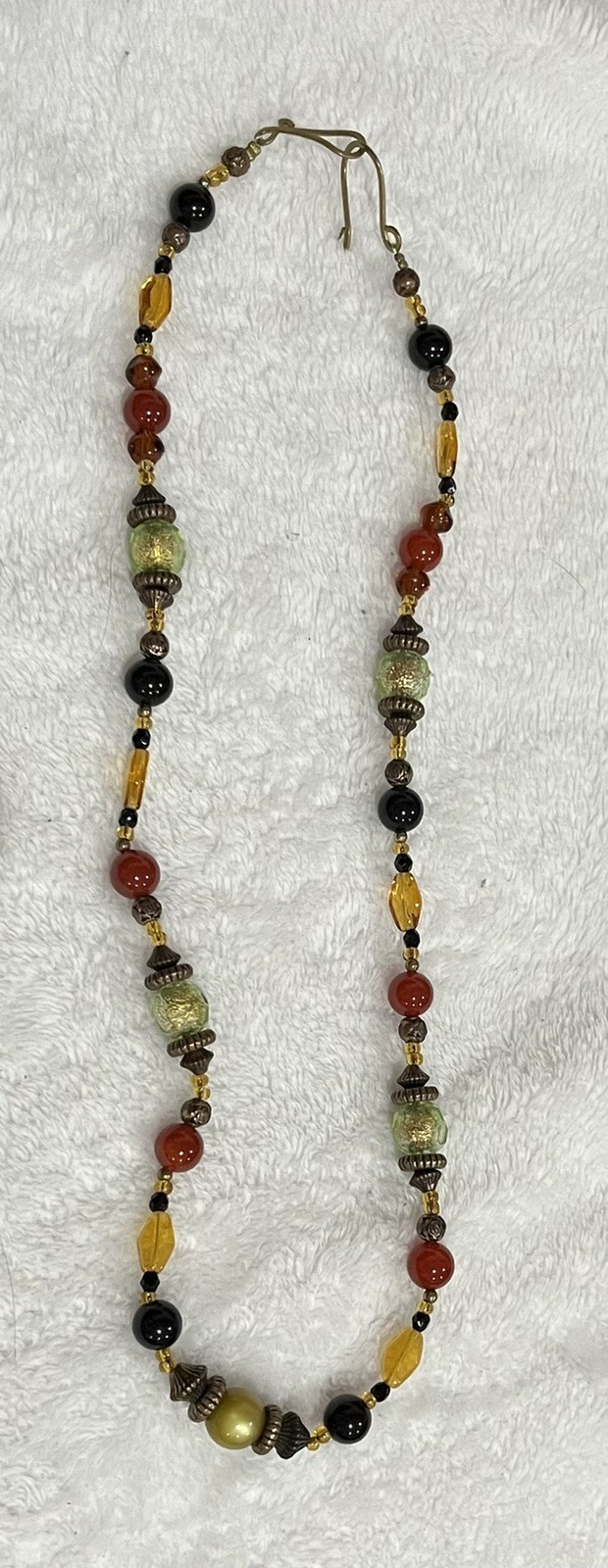 brass tone necklace with bali beads and gemstone Beads