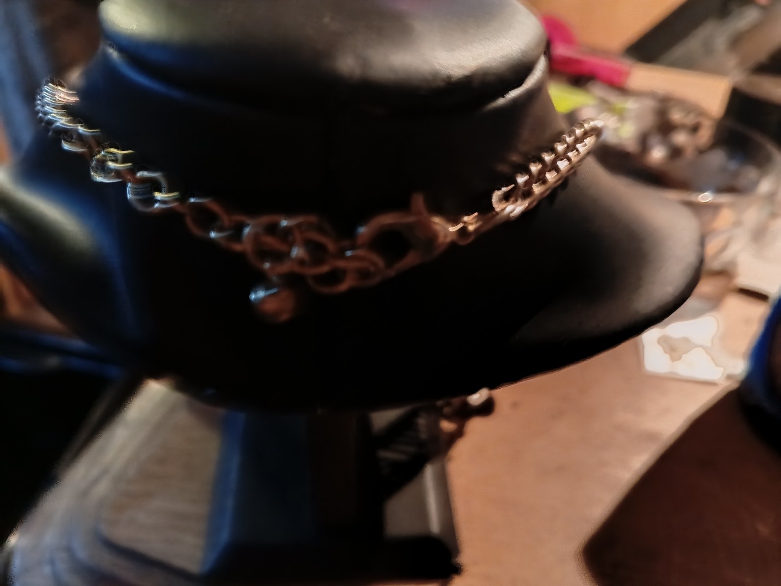 silver-toned bib choker features dangling teardrop rhinestones.