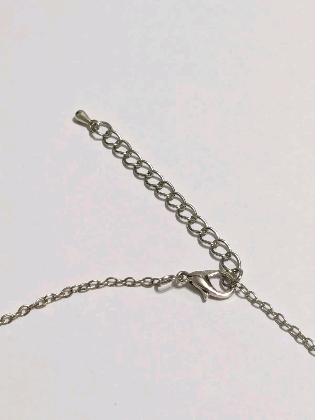 Interlinked Hearts Blue Rhinestones & Silver Tone Pendant Necklace. 16″. 2″ Ext.