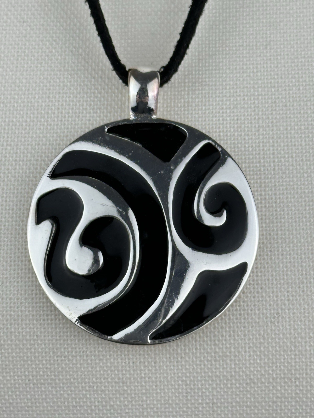 Roman Silvertone And Black Round Circle Swirls Pendant Necklace