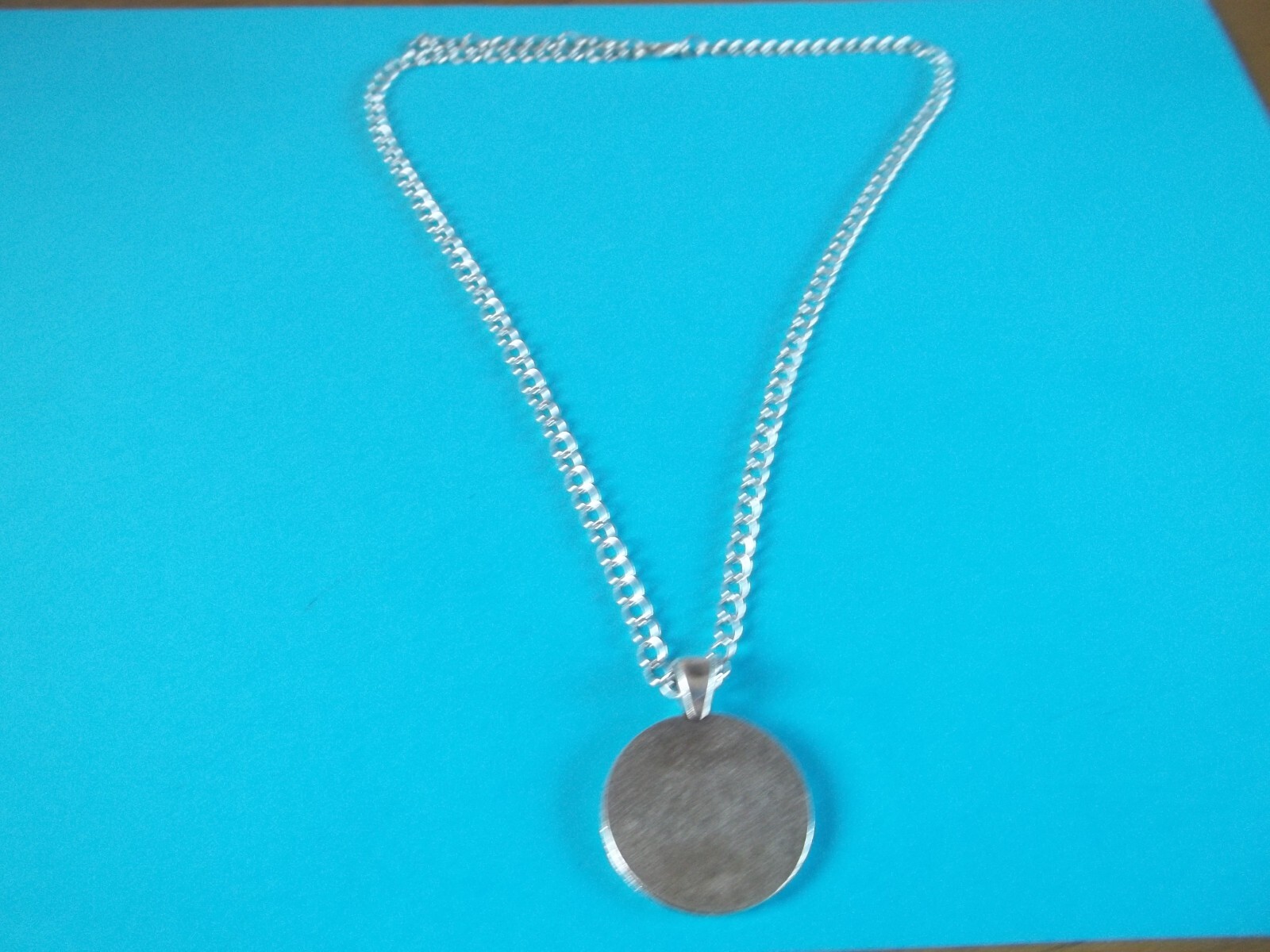 BRITANNIA FARTHING – LIMITED EDITION – SILVER CASED CURB NECKLACE – 1911 to 1936
