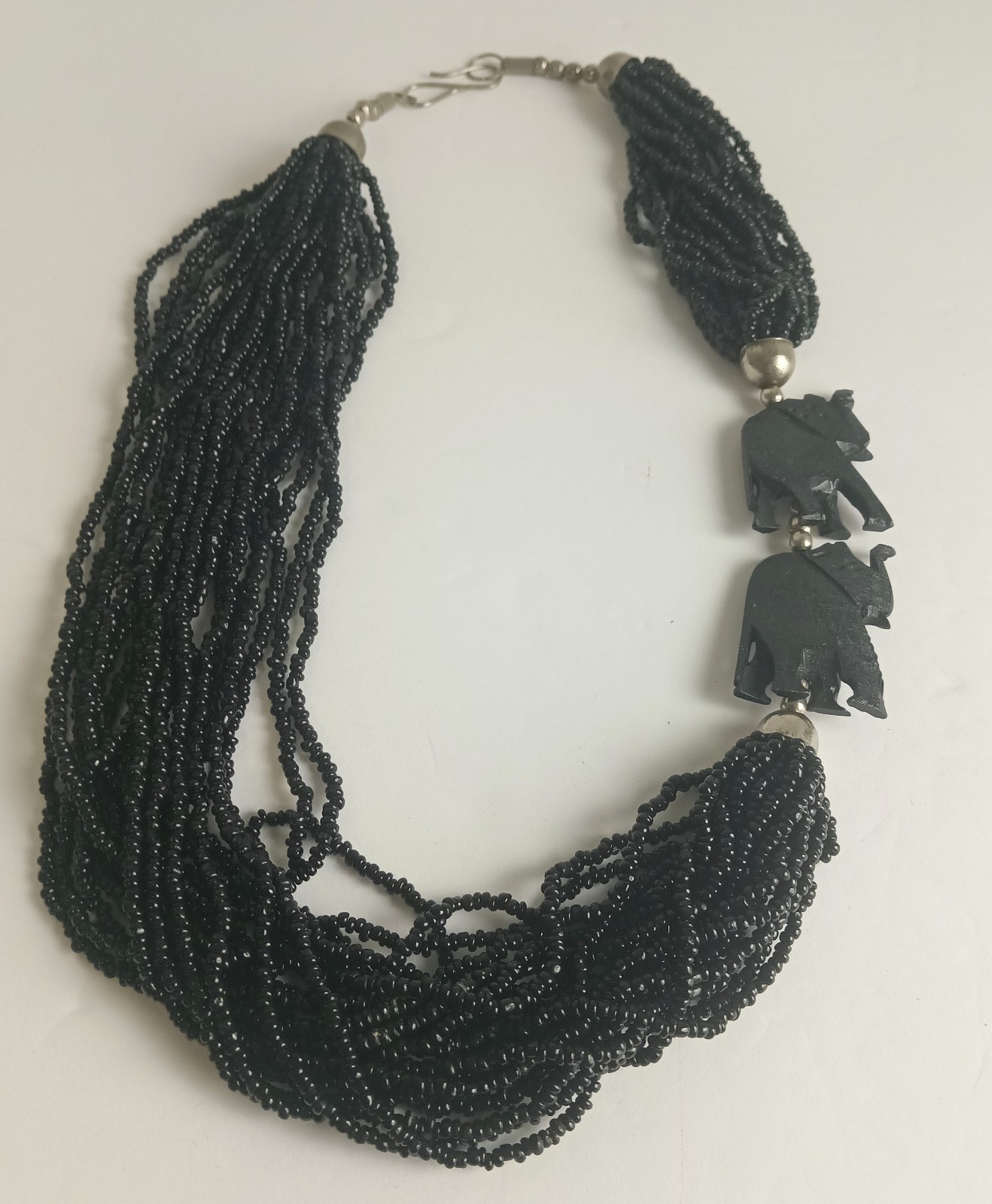 Layered Seed Bead Tribal Necklace with Carved Wooden Elephants Upturned Trunk