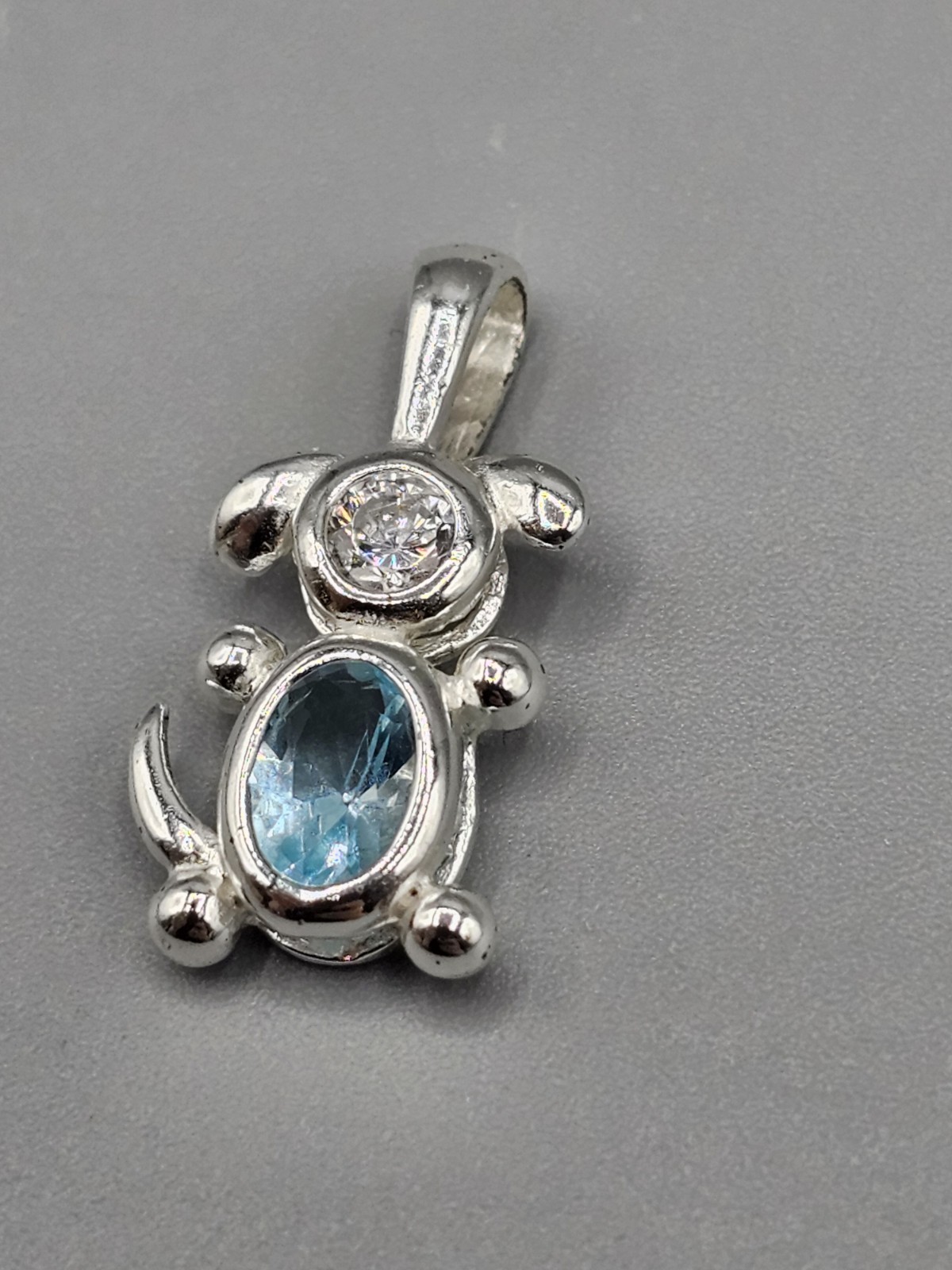 Sterling Silver Dog Bezel/Prong Set Cubic Zirconia Blue Simulated Stone Pendant