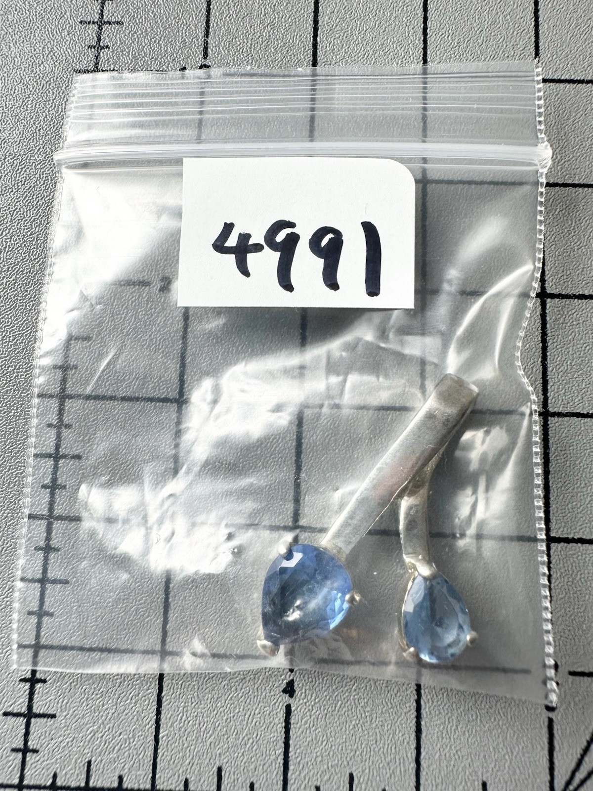Silver Tone Trillion Cut Blue Stone Pendant