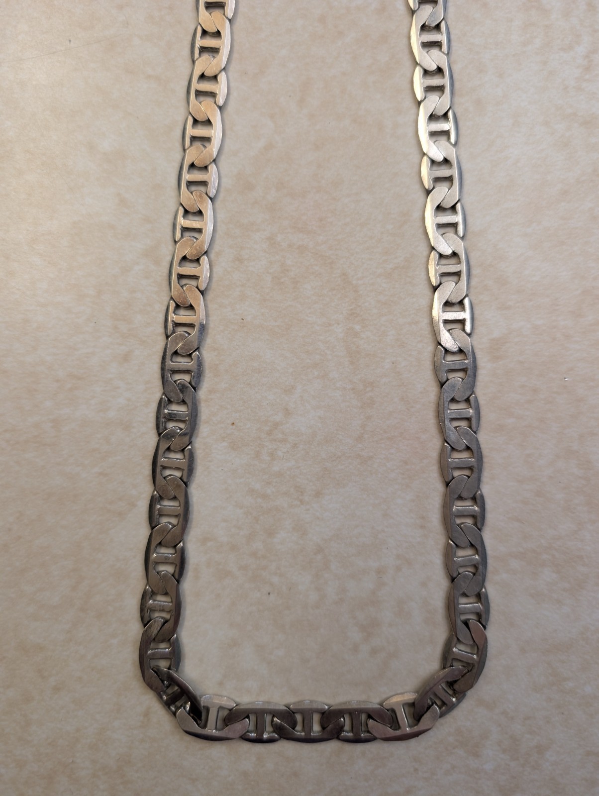 Flat Laying Silver Tone Stainless Steel Figaro Chain Necklace Lobster Clasp
