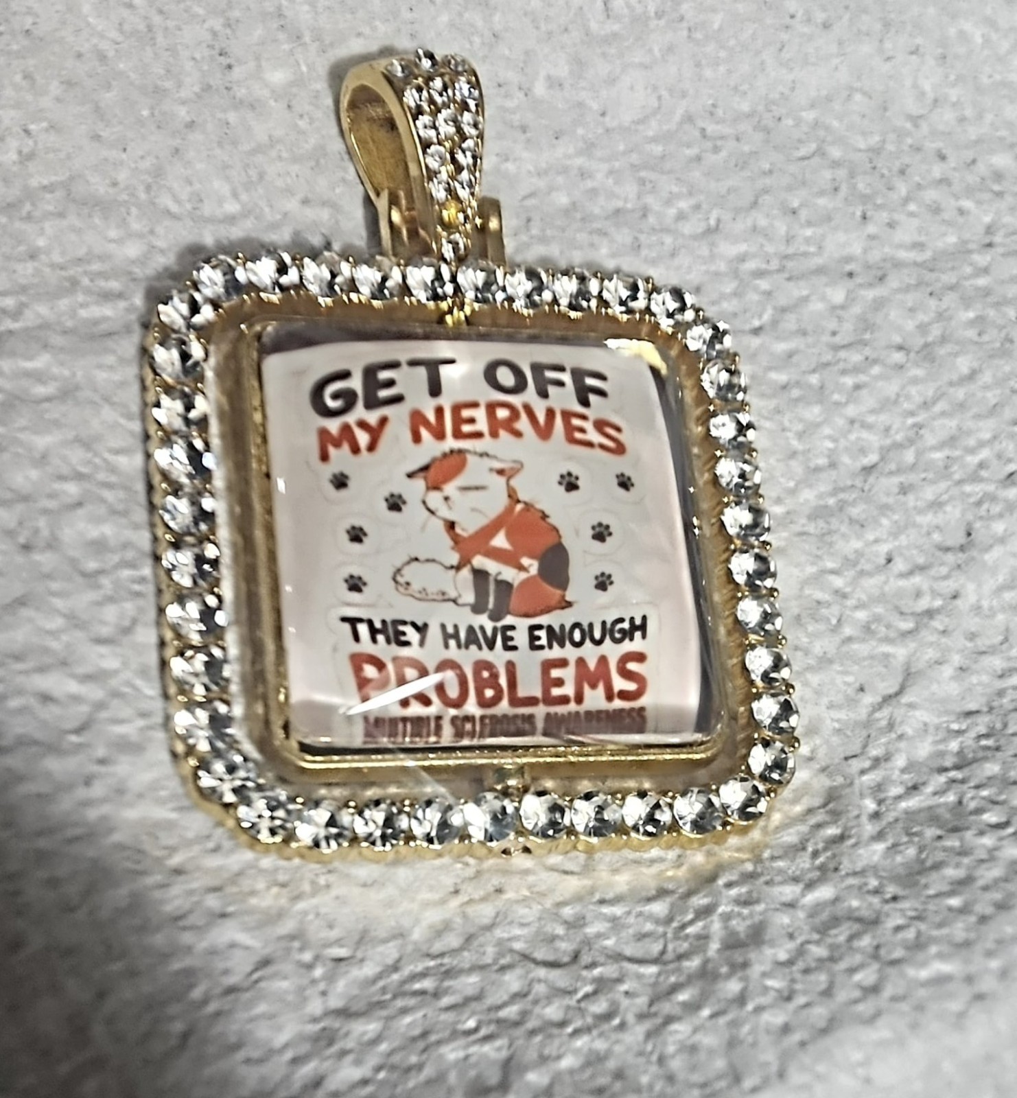 Gold Tone Square Pavé Rhinestone Crystal Pendant Charm, M.S. Awareness “GET OFF”