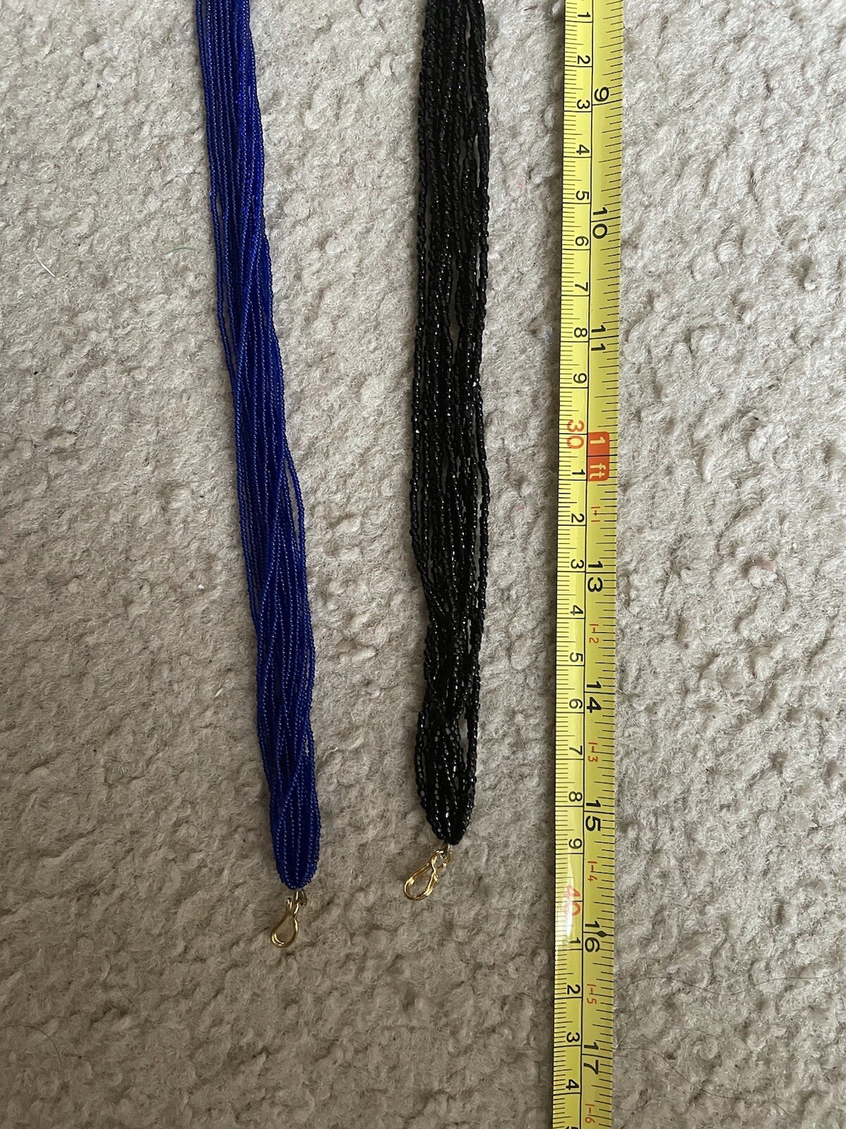 Beautiful Multi strand beaded necklace with hook. Length: 16”