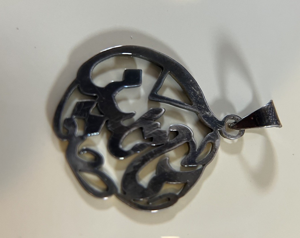 Custom Arabic Calligraphy Name Pendant – “Nidal” (Non-Magnetic Metal)
