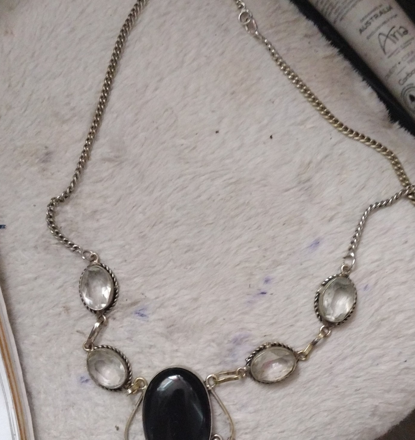 Silver Tone Necklace with Black Oval Cabochon Pendant & Clear Oval Stones