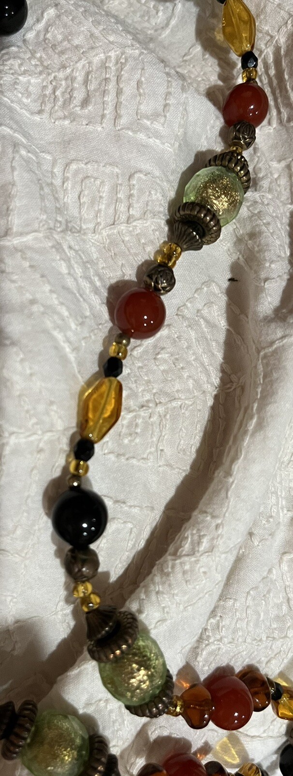 brass tone necklace with bali beads and gemstone Beads