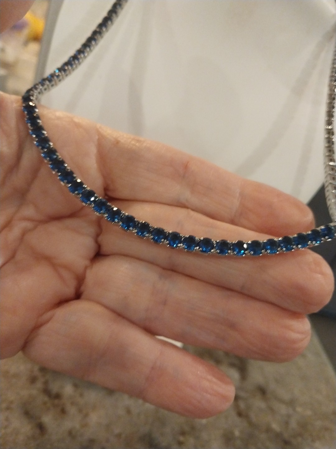 Simulated Sapphire Tennis Necklace (18-26 Inches) with Bolo Slider in Silvertone