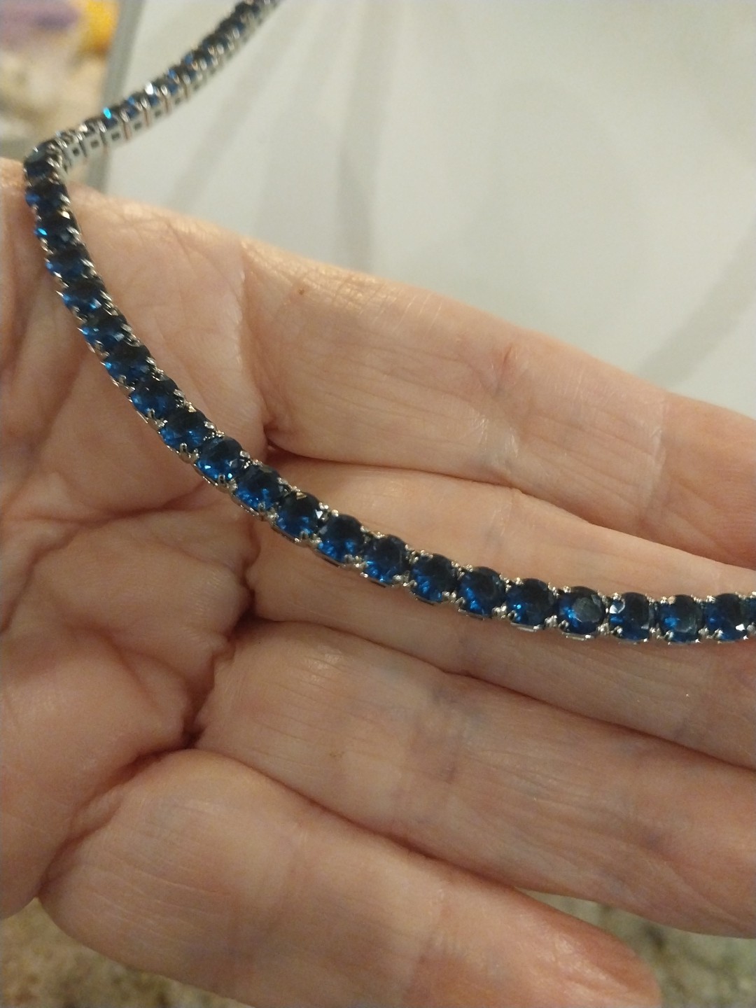 Simulated Sapphire Tennis Necklace (18-26 Inches) with Bolo Slider in Silvertone