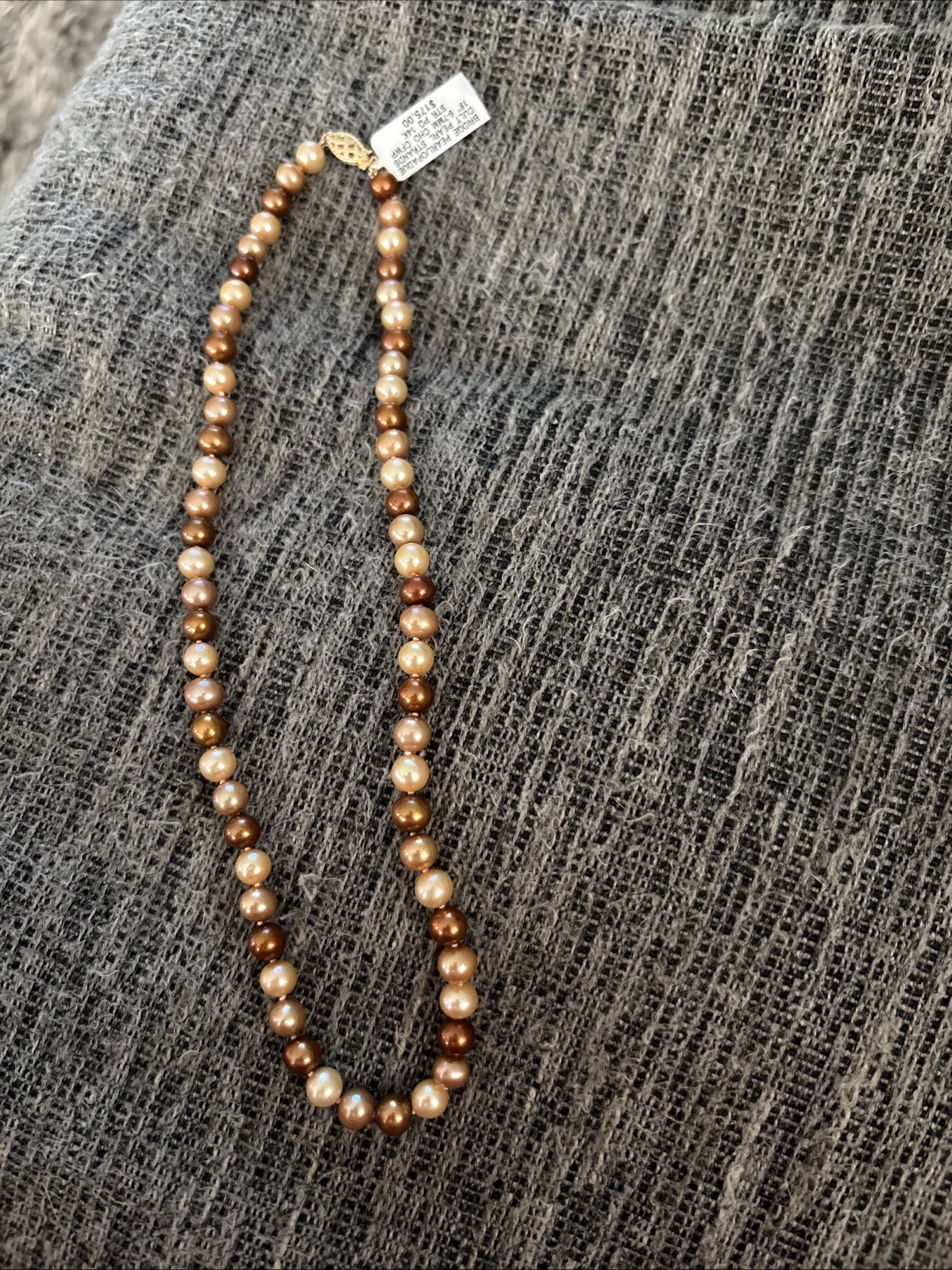 New Bridge Pearl/Opaque Cultured Strand 18” 6-7MM 14k- $175 Neural Colors