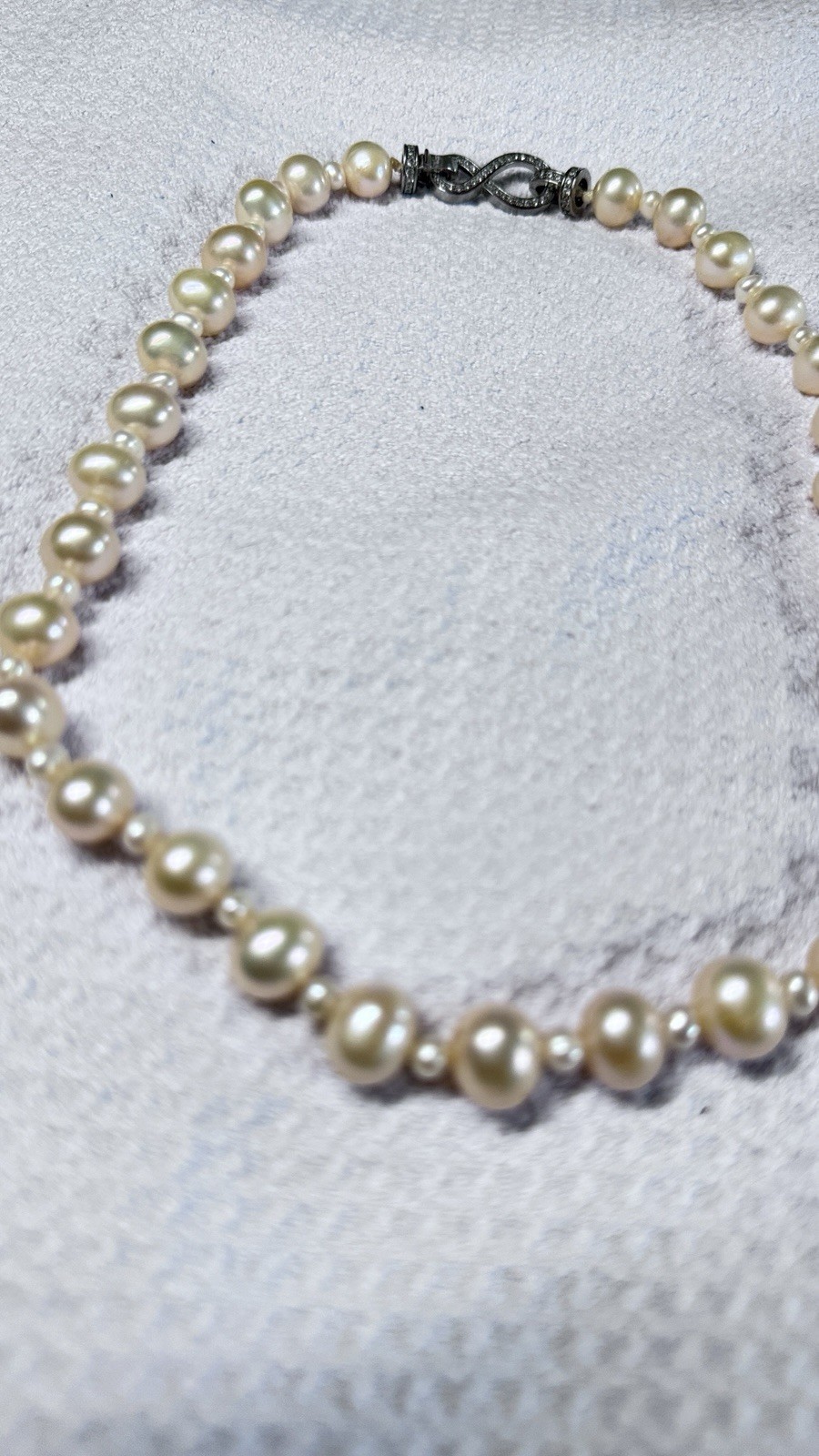 High-quality freshwater pearls with natural aurora luster. (11mm–12mm)