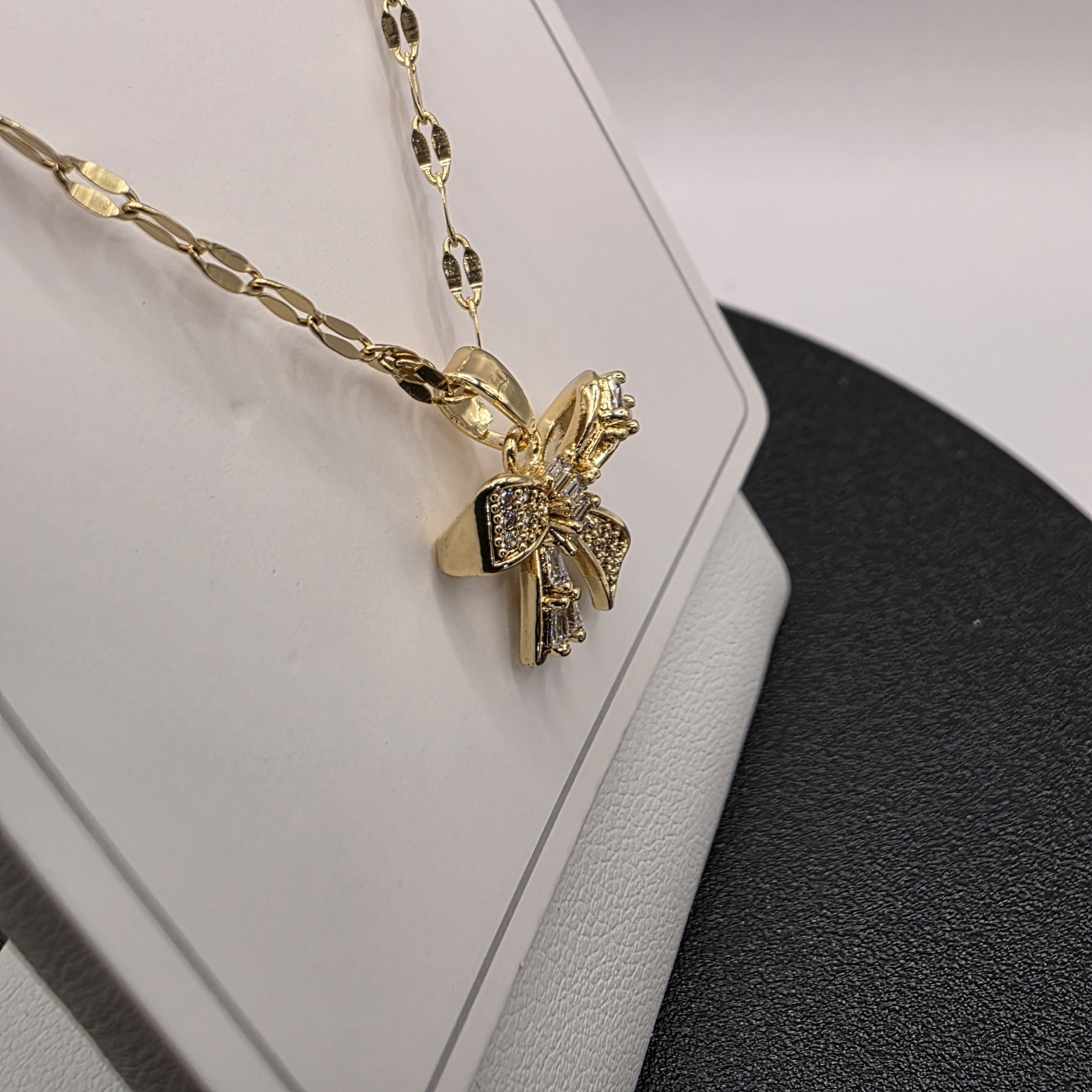 Stainless Steel Copper Plated 16″Necklace w/13mm Cubic Zirconia Bow Pendant