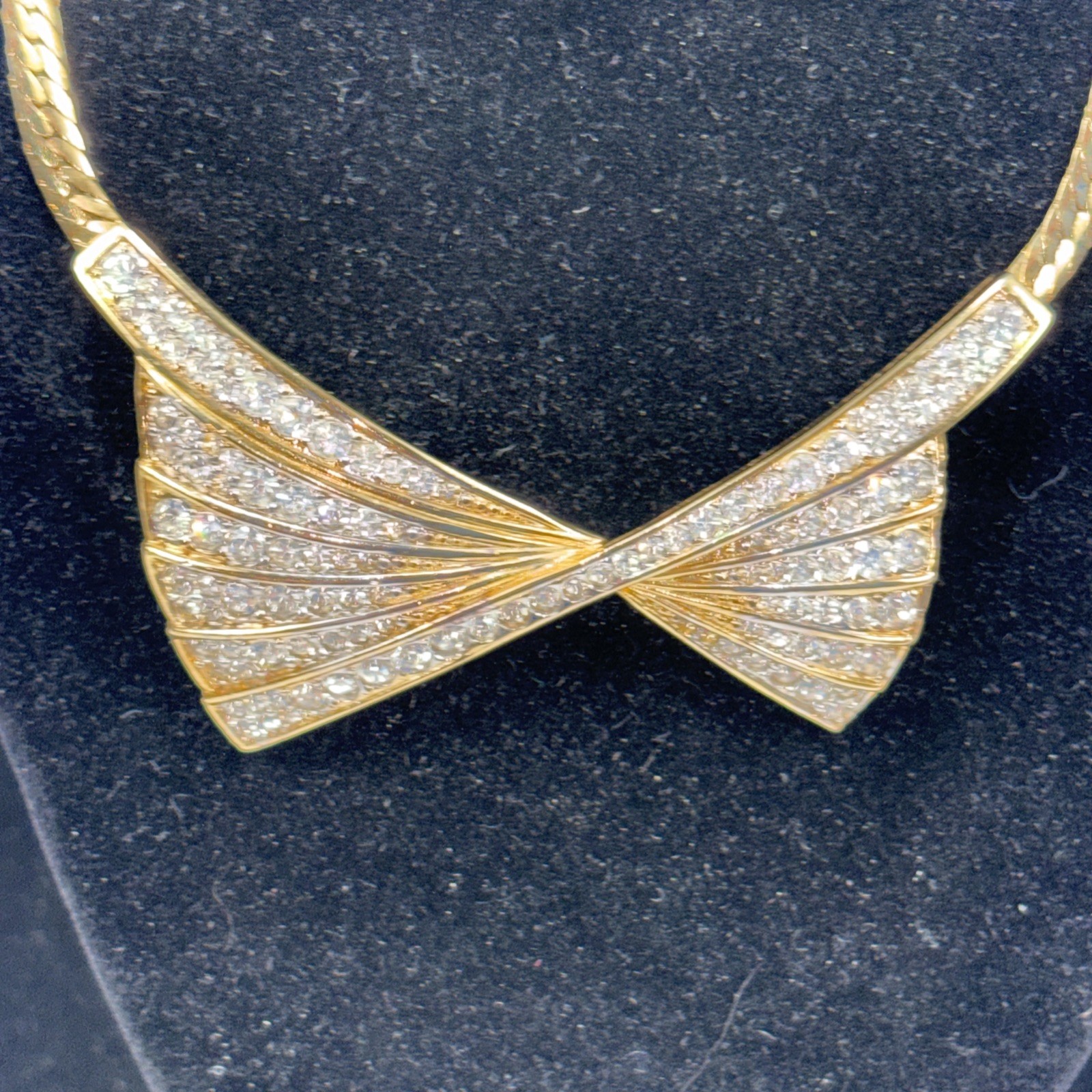 Beautiful Nina Ricci Pave Set Rhinestone Bow Tie Necklace in Goldtone