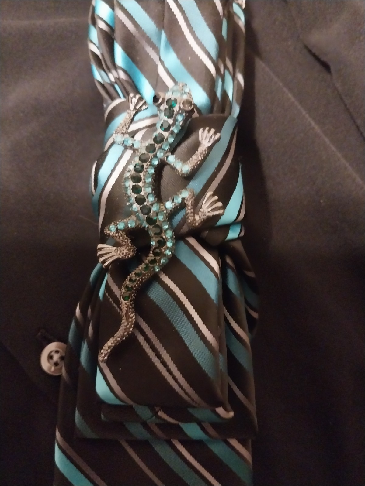 Tie necklace – black/turquoise/grey stripe with black/turquoise chameleon brooch