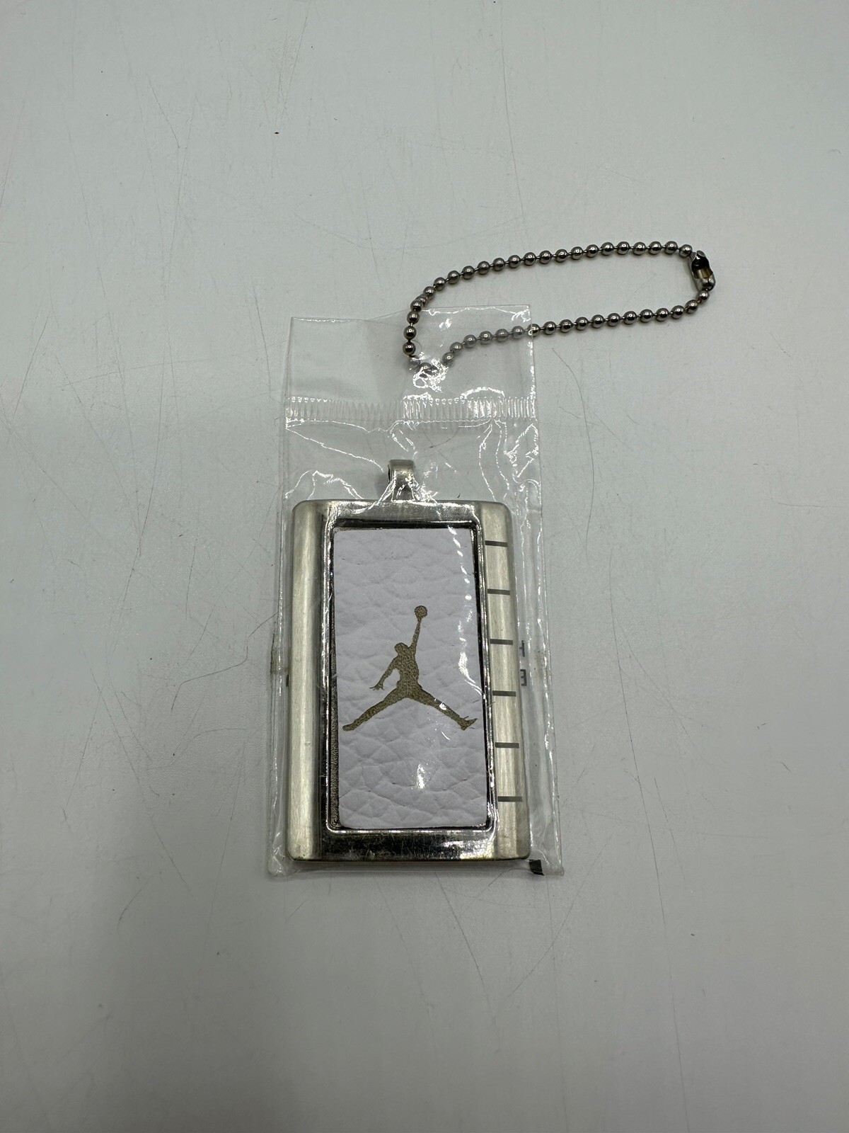 AF-1 Michael Jordan Nike Pendant, Dog Tag, Keychain Metal & White Jump Man Logo