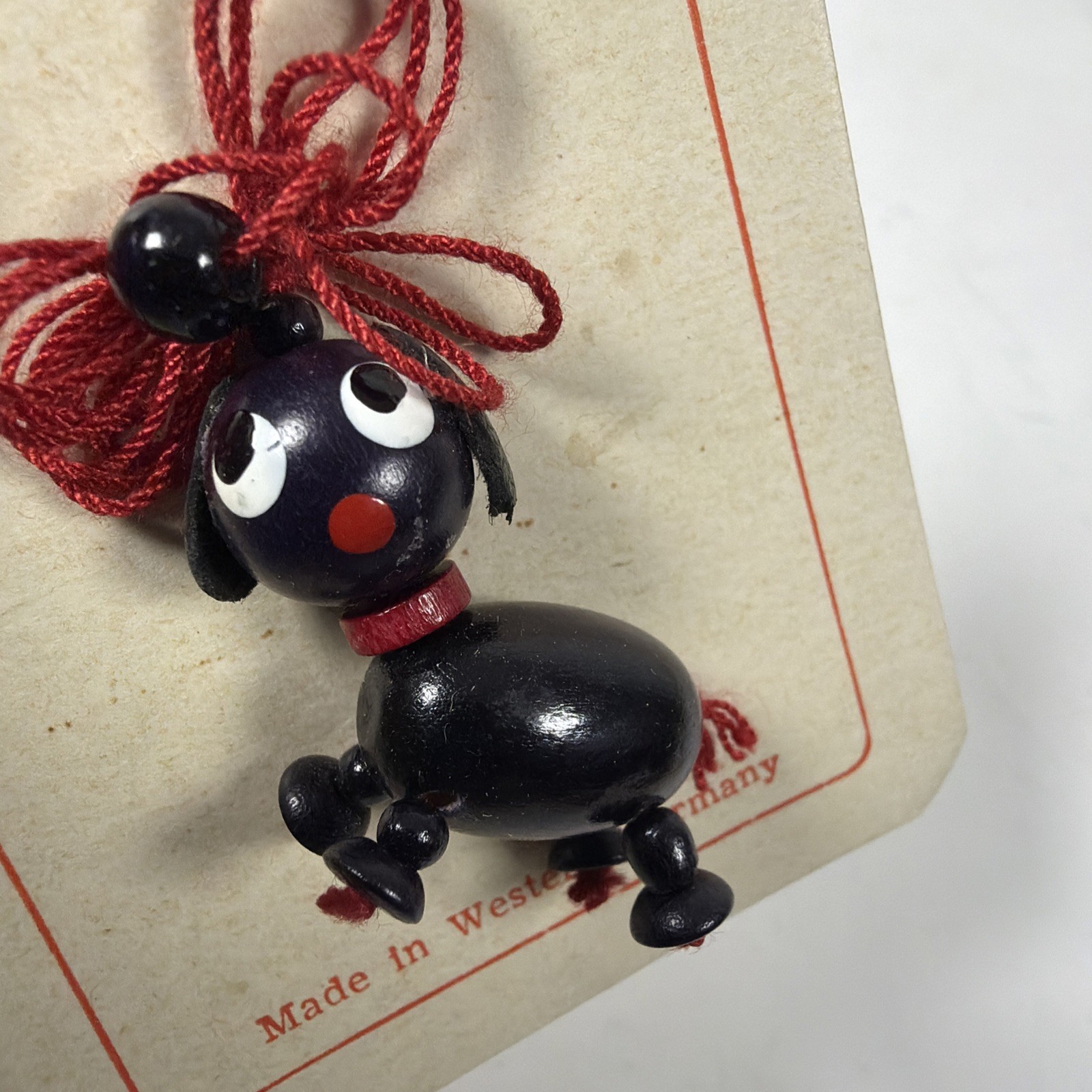 Vtg 1” Wooden Black Dog Pendant – Western Germany – New
