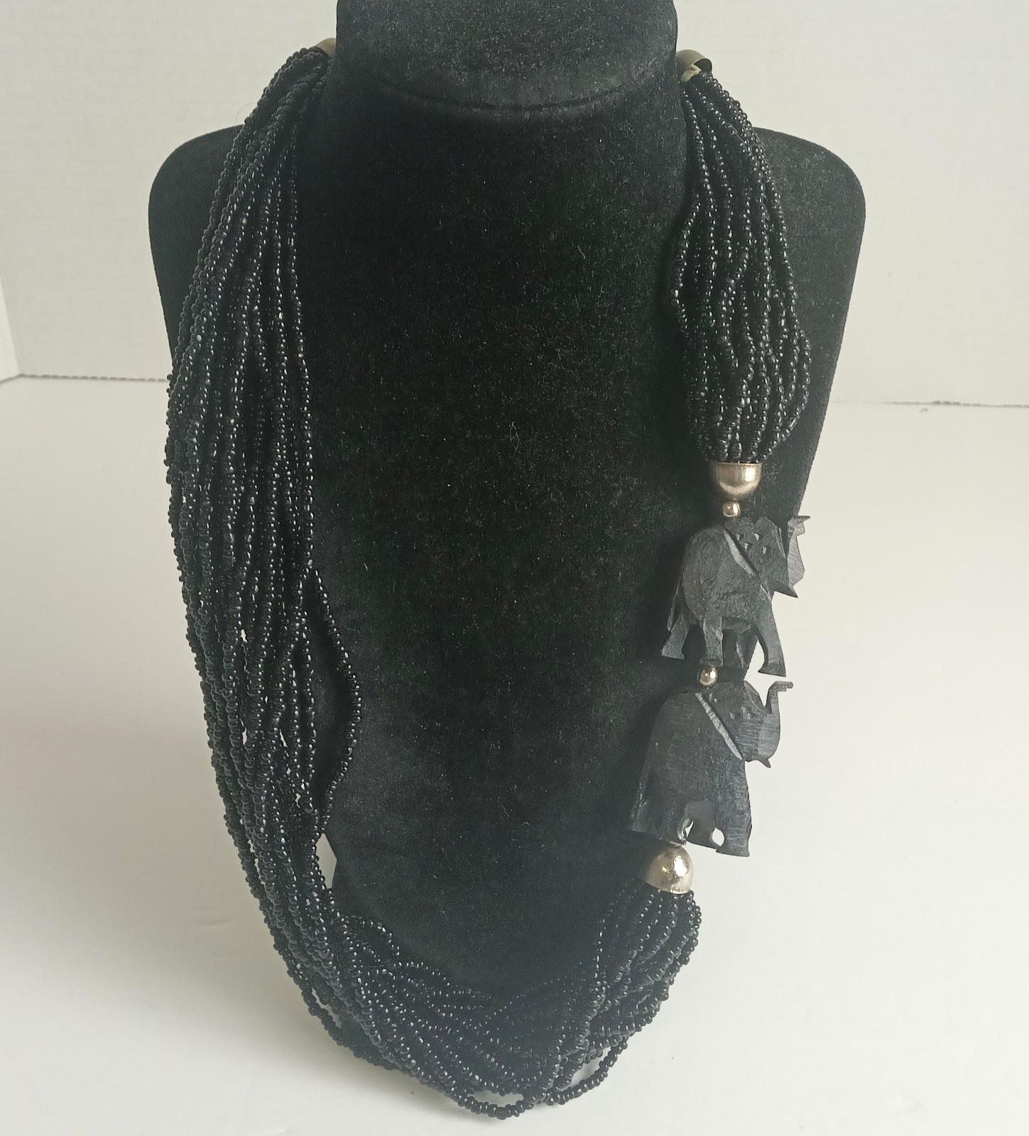 Layered Seed Bead Tribal Necklace with Carved Wooden Elephants Upturned Trunk