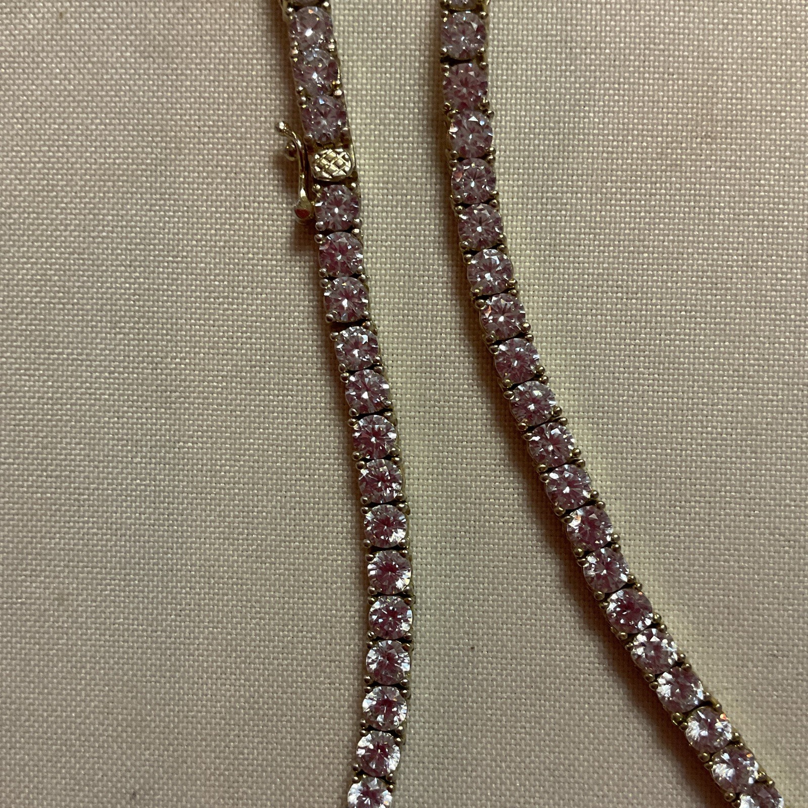 18 carat solid Gold chain with lab grown diamonds. Can prove authenticity.