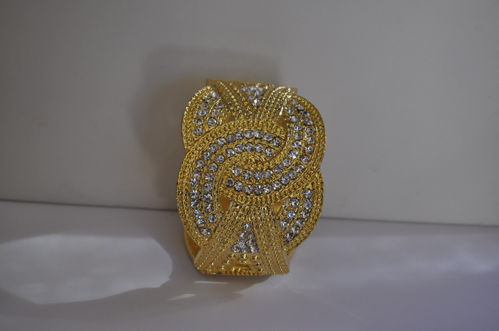 KIRKS FOLLY AURORA BOREALIS CRYSTAL CUFF BRACELET IN GOLD TONE