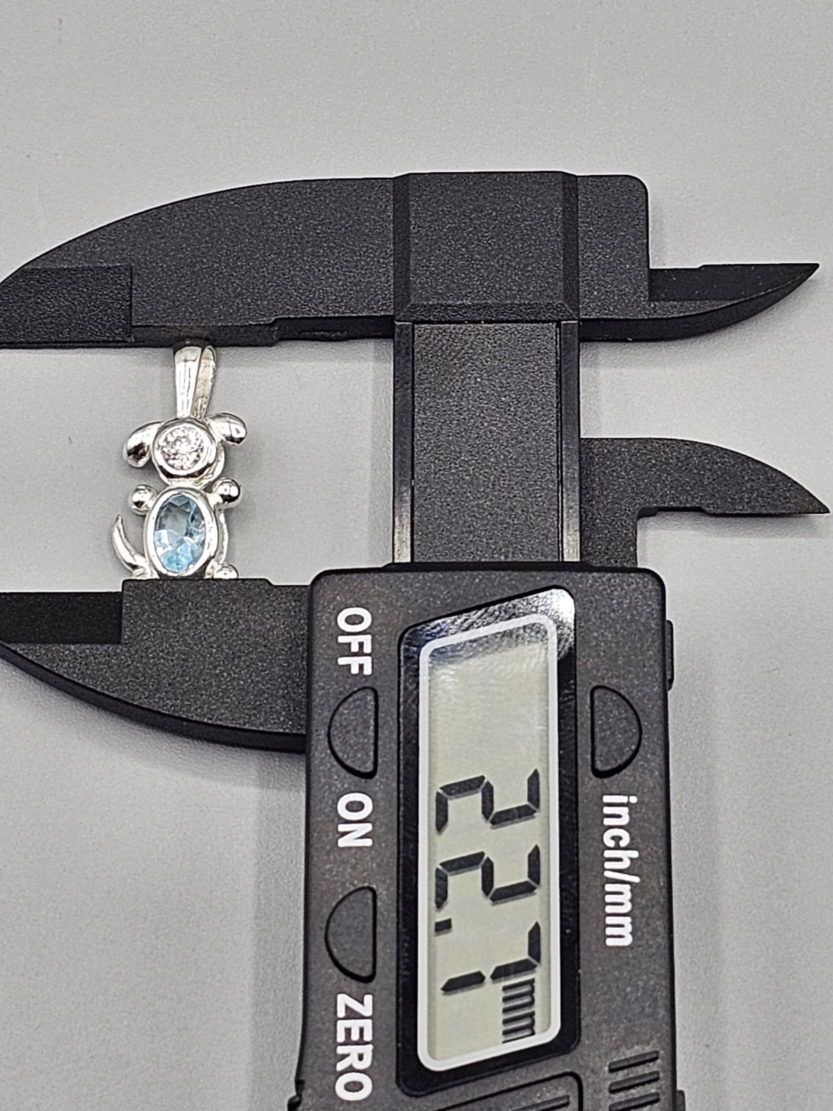 Sterling Silver Dog Bezel/Prong Set Cubic Zirconia Blue Simulated Stone Pendant