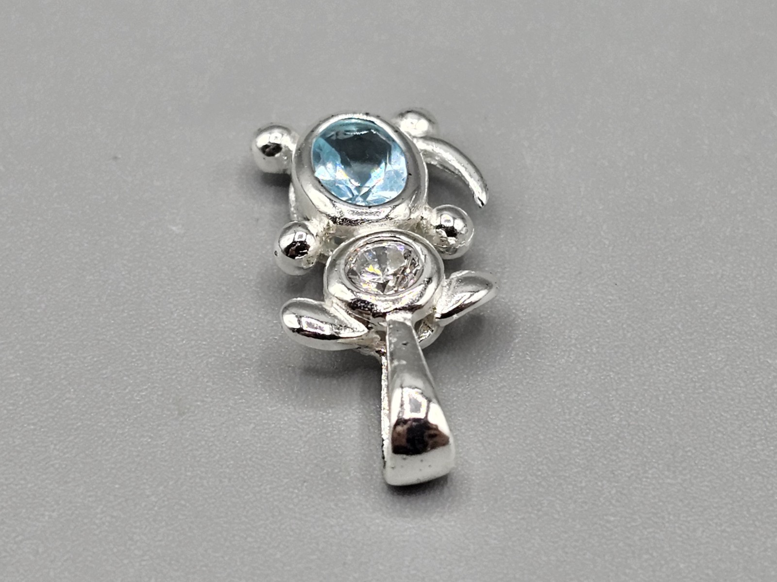 Sterling Silver Dog Bezel/Prong Set Cubic Zirconia Blue Simulated Stone Pendant