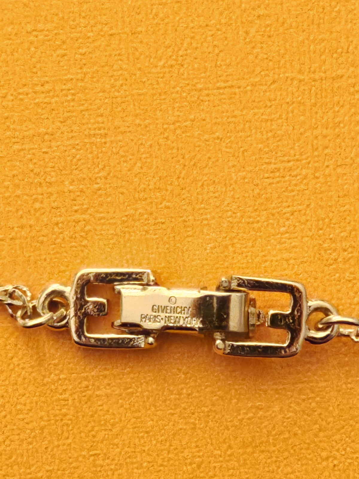 Givenchy Signed Gold Tone Herringbone Chain Square Logo Pendant Necklace