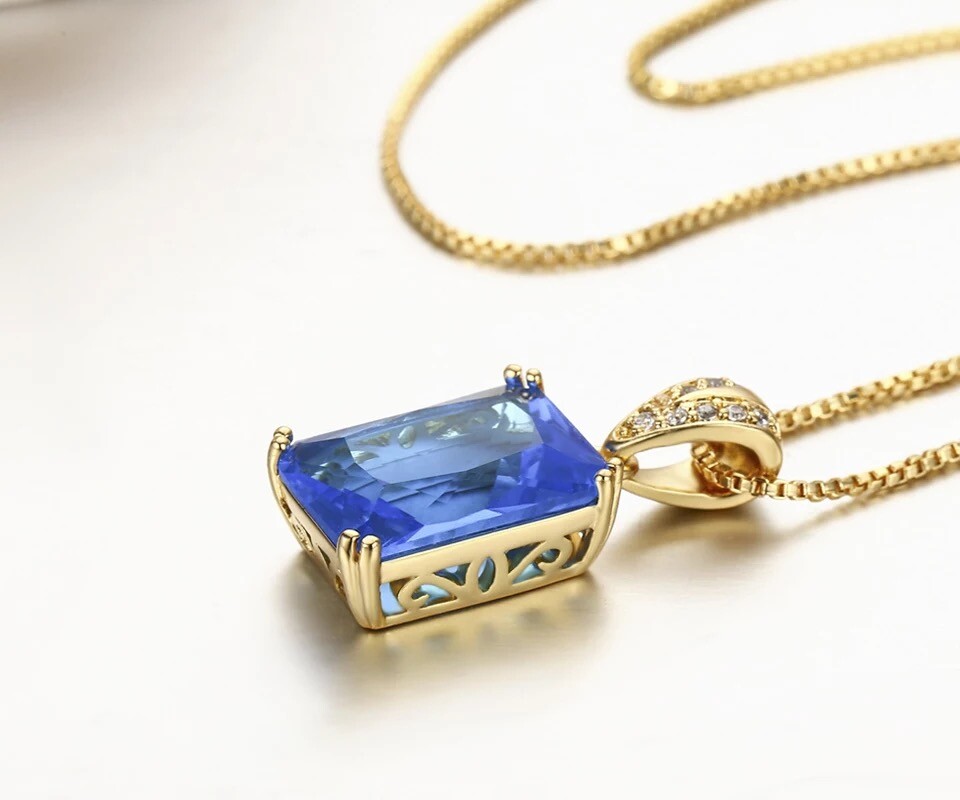 ZARD Emerald-Cut Rectangle Blue Cubic Zirconia Pendant Necklaces in Gold Tone