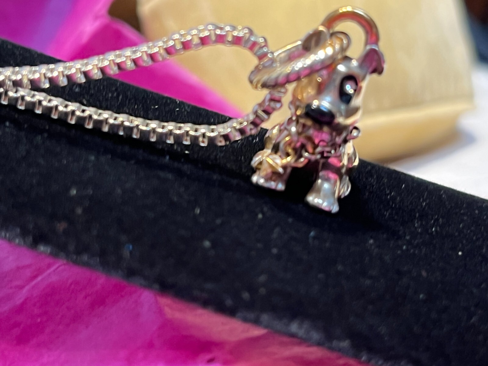 An Adorable Sterling Silver & Gold Puppy, Chain Patch on Eye & Crystal Eyes