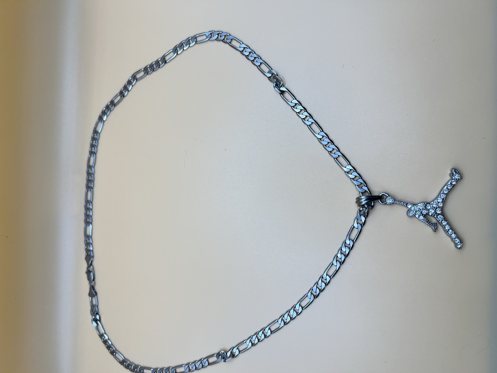 Silver Tone Stainless Steel Figaro Chain Necklace, Clear CZ Sports Charm Pendant