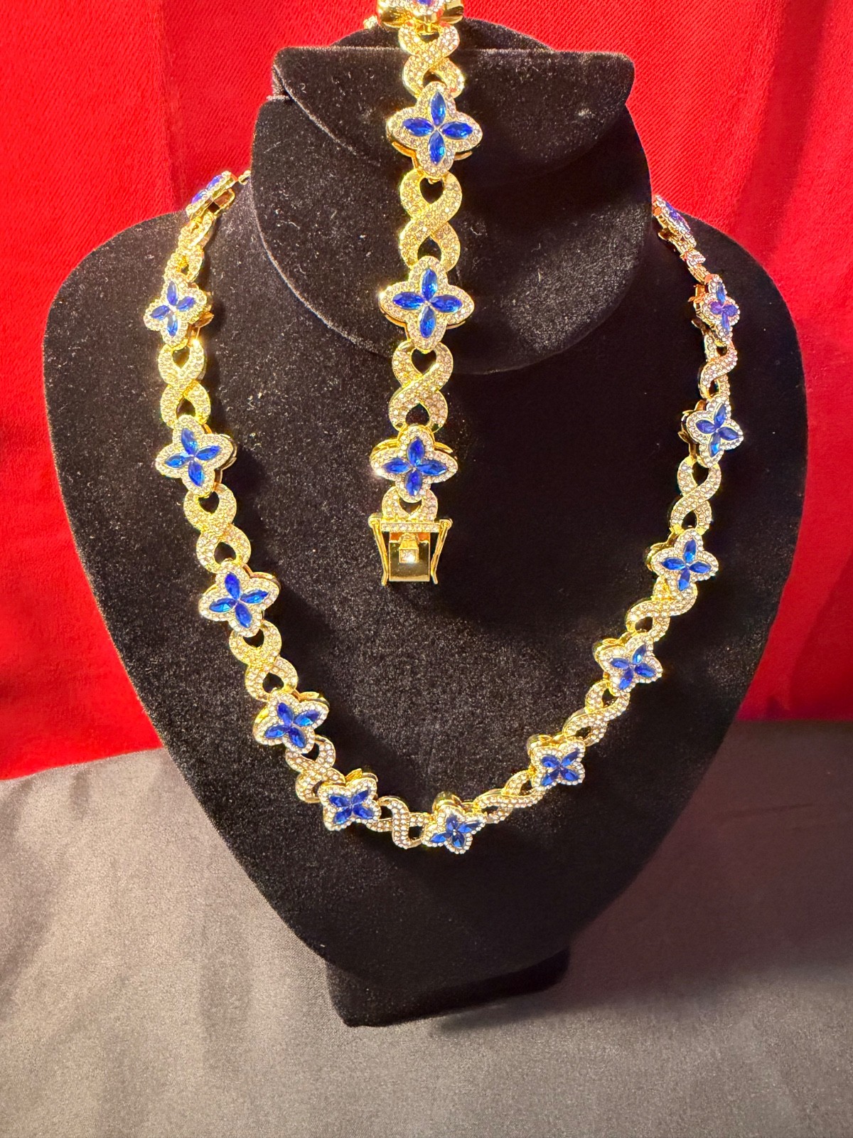 CZ Clover chain and bracelet yellow gold plated blue and white gem stones