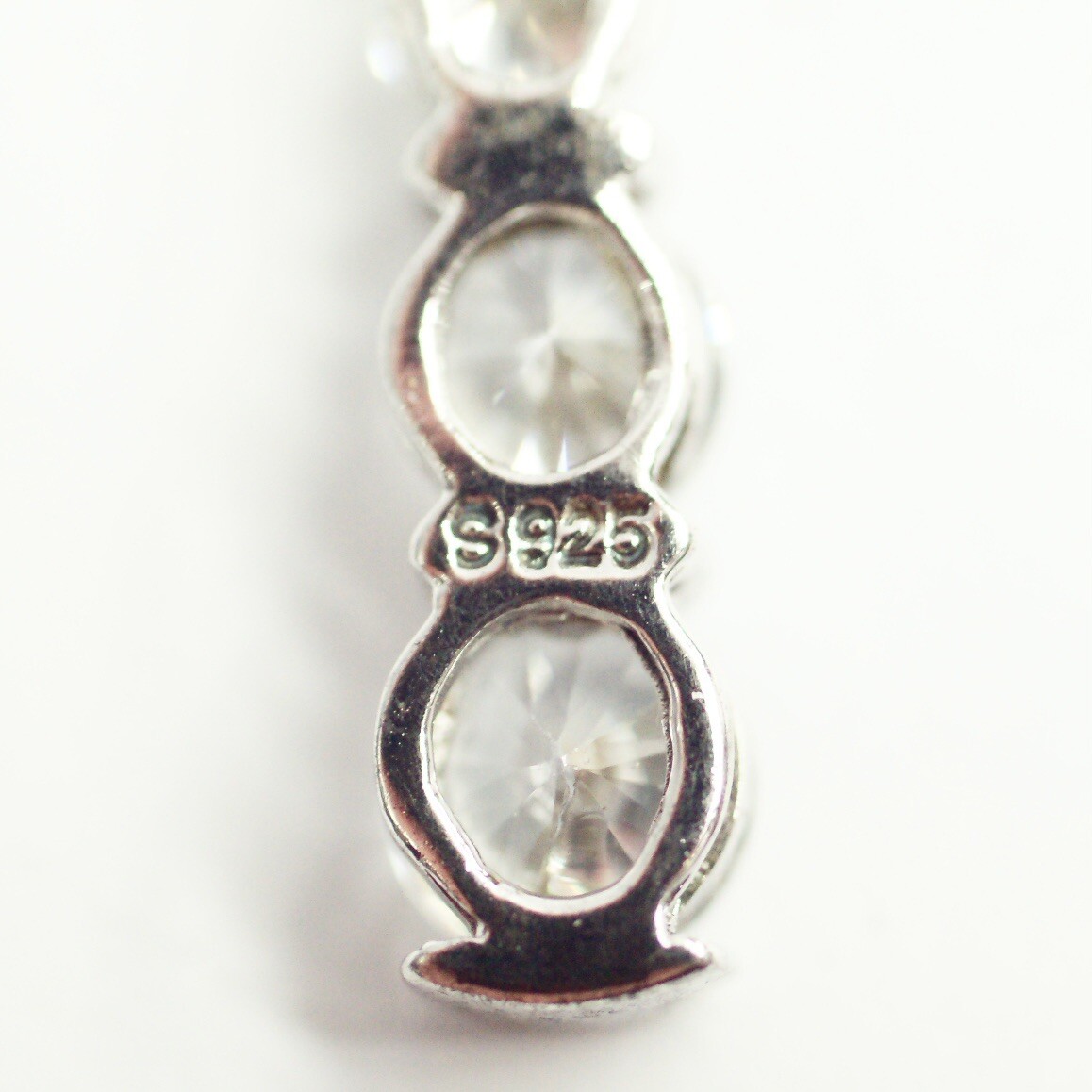 Sterling silver white/colorless CZ graduated five stone pendant necklace